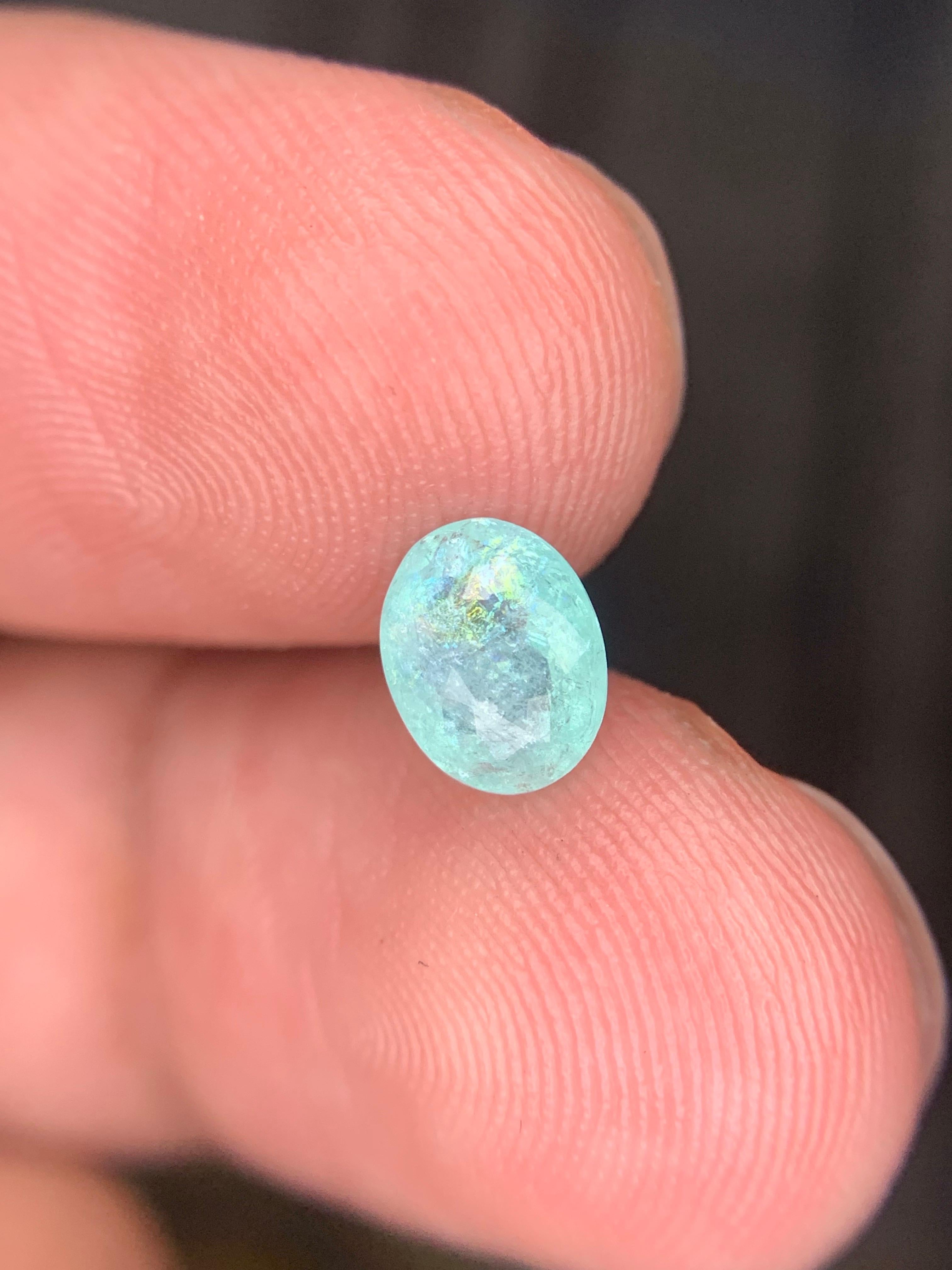 Gemma di forma ovale di tormalina Paraiba sciolta naturale certificata AIG da 0,98 carati in vendita 9