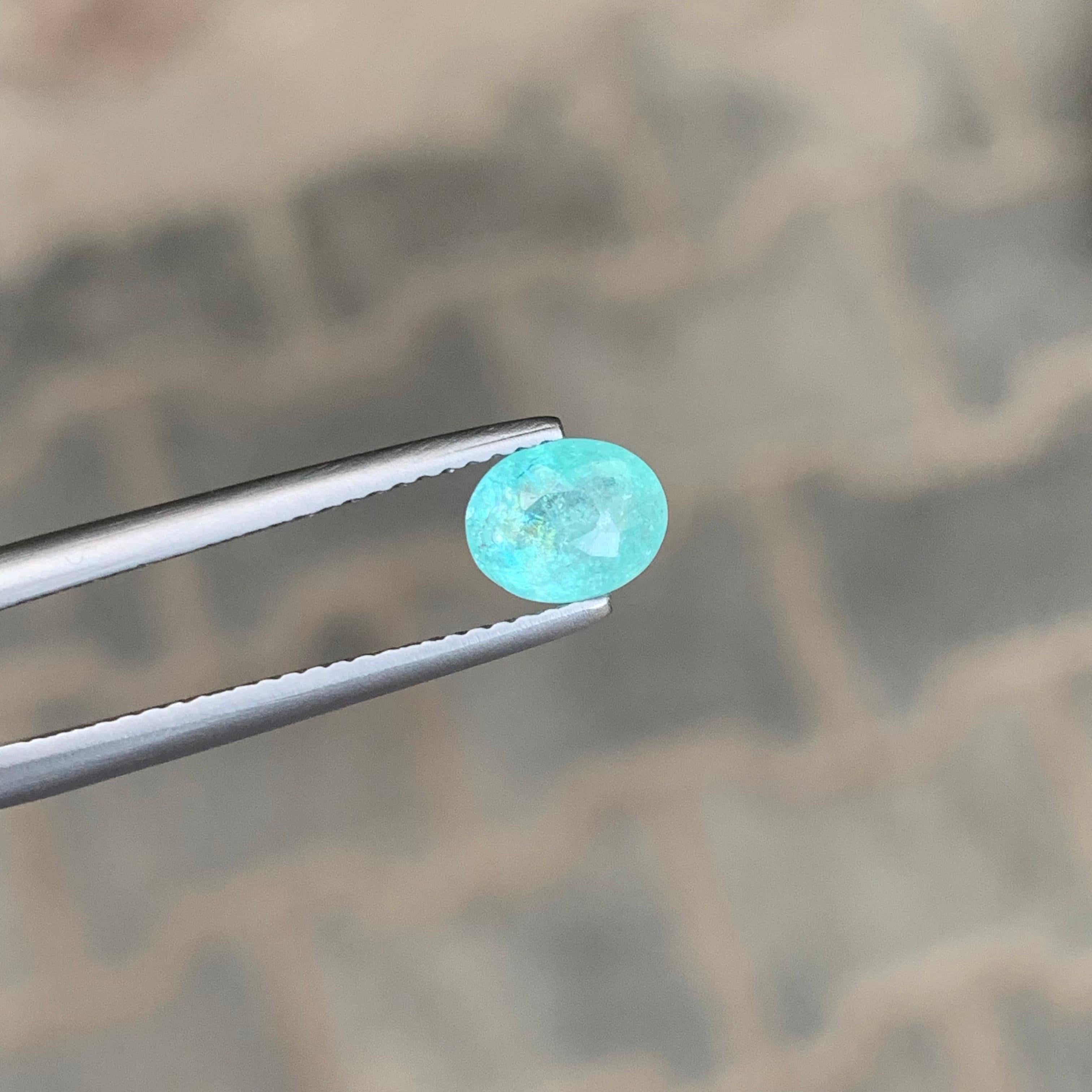 Gemma di forma ovale di tormalina Paraiba sciolta naturale certificata AIG da 0,98 carati in vendita 2