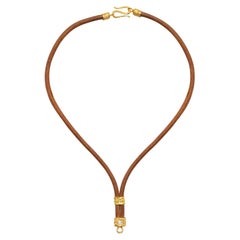The Allegra Leather and 22k Gold Necklace in Brown, by Tagili