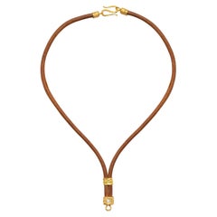 The Allegra Leather and 22k Gold Necklace in Brown, by Tagili