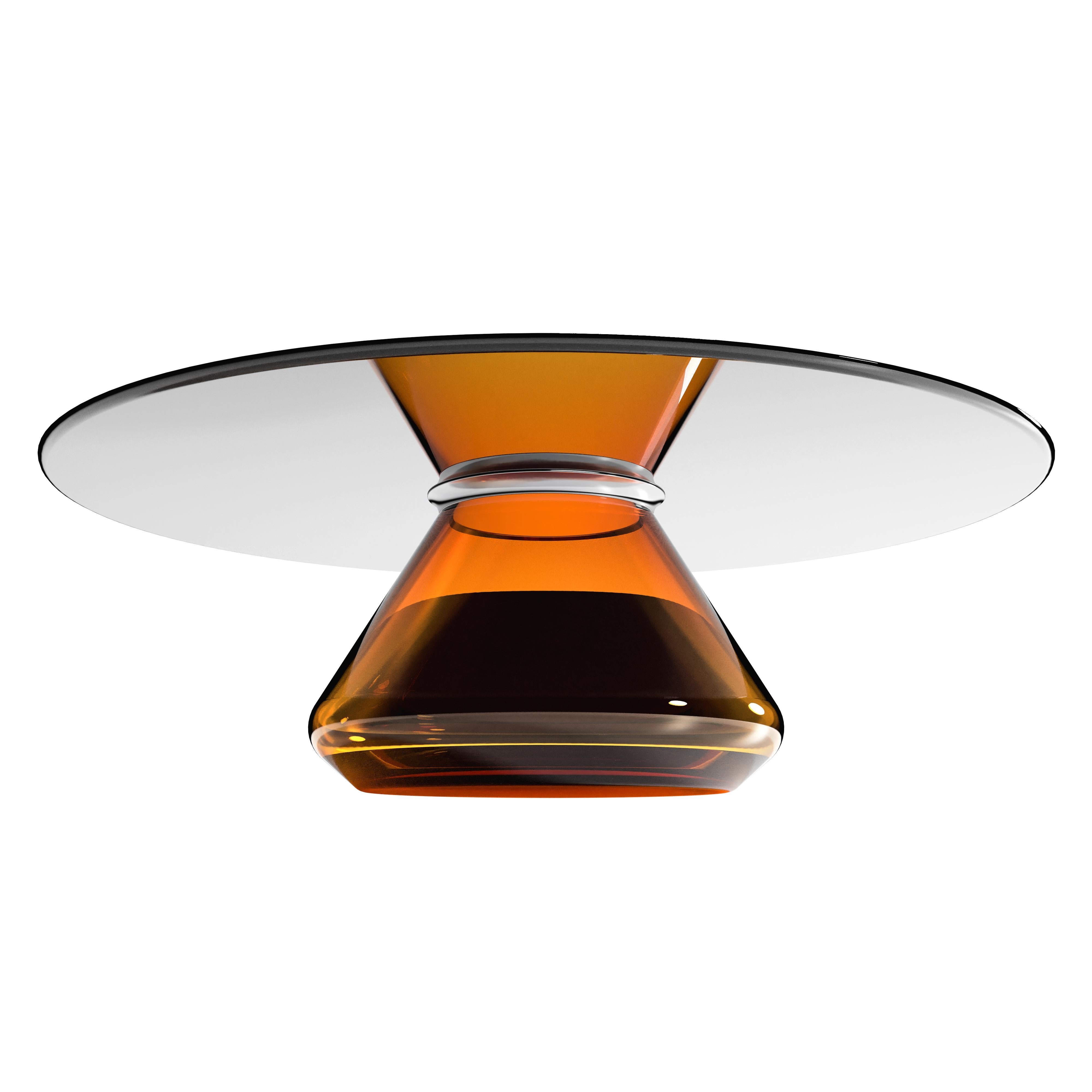 The Amber Eclipse II coffee table by Grzegorz Majka.
Limited Edition of 8
Dimensions: 40 x 40 x 12.40 in
Materials: Glass

The total eclipse of every interior? With this amazing table everything is possible as with its Minimalist style it will