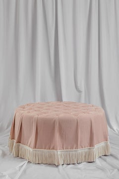 The Amelia Ottoman, in deep buttoned pink linen, ticking stripe & bullion fringe