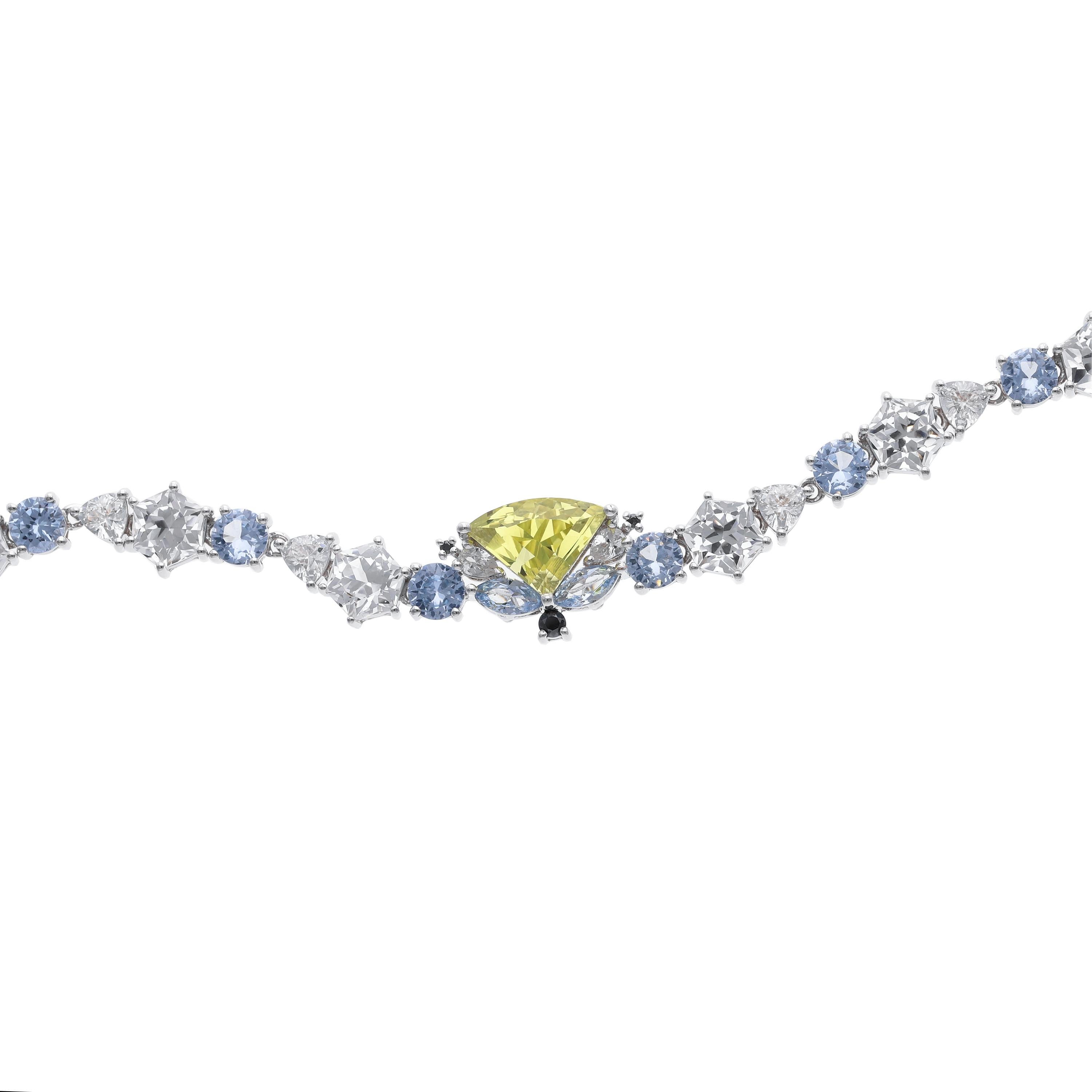 Named after the Greek goddess of the ocean, Amphitrite, this choker truly befits a mermaid. The centrepiece of the choker features an incredibly rare fan shaped yellow sapphire, reminiscent of Venus’s scallop shell in The Birth of Venus. The fan is