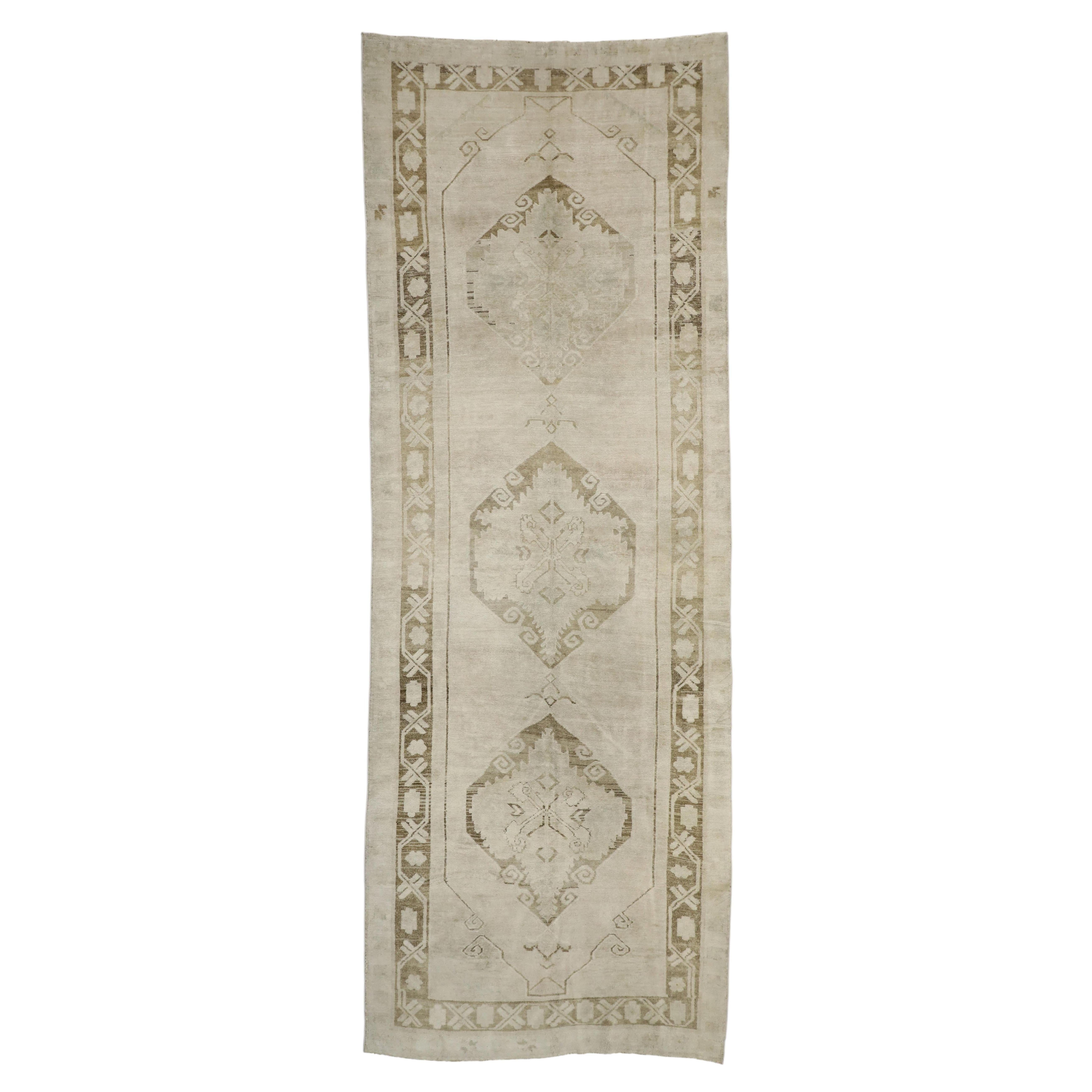 The Ancestral Passage: A Vintage Turkish Oushak Masterpiece of Quiet Power For Sale