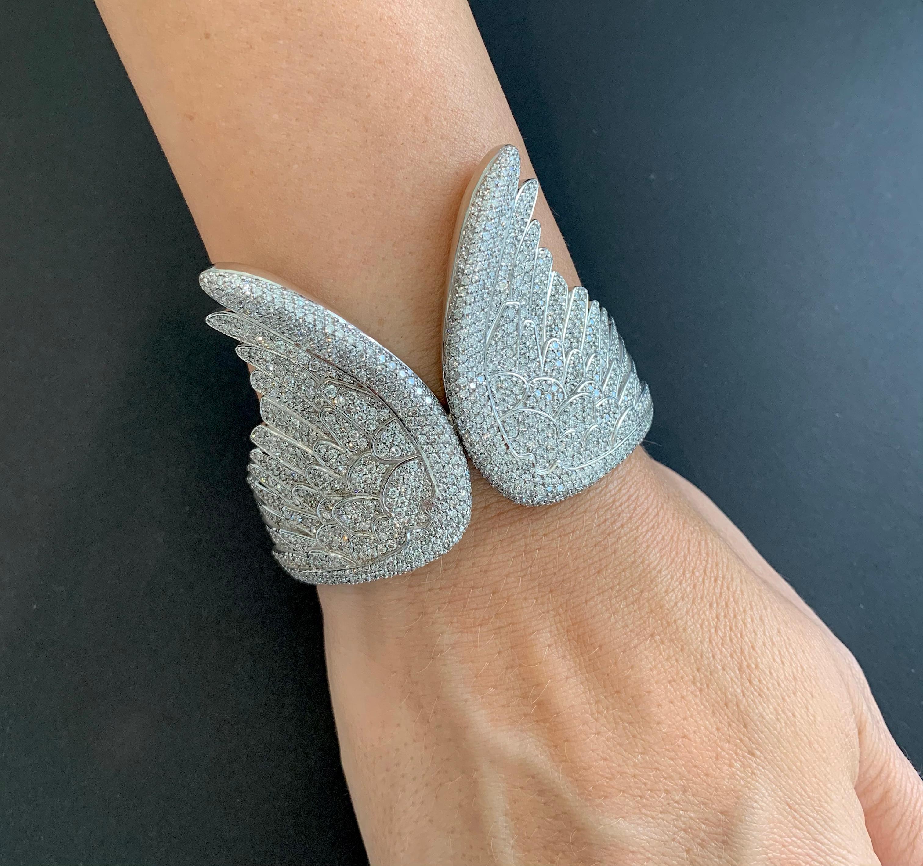 The Angel Wing Cuff
White Diamonds set on White Gold.
Crafted to order. Please allow up to 3 weeks for delivery.