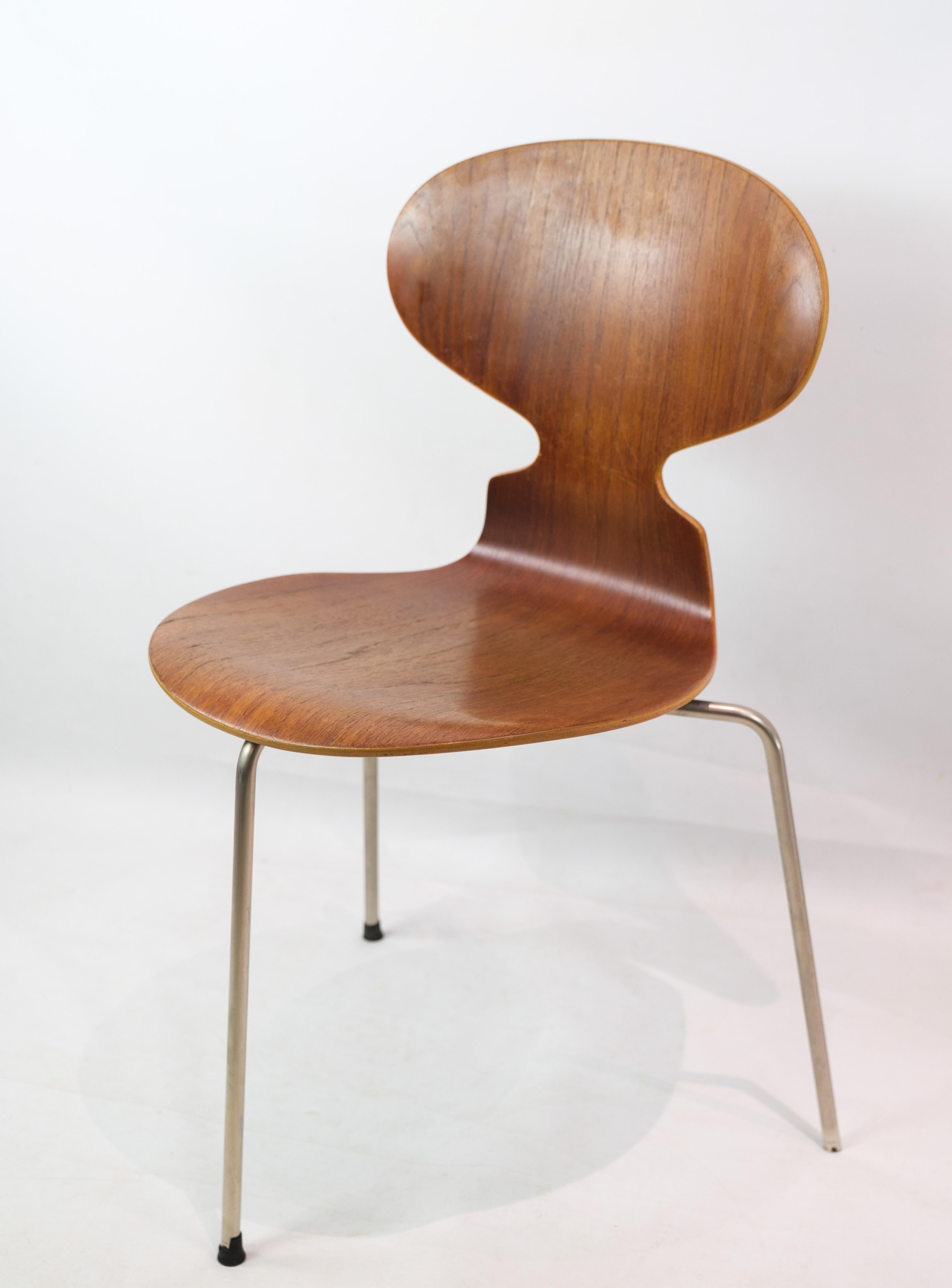 The ant, model 3100, designed by Arne Jacobsen (1902-1971) in teak wood, manufactured by Fritz Hansen. This chair has three metal legs and is a very early model, due to the metal bracket at the bottom. Appears in very good used condition.

This