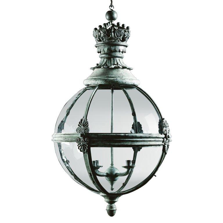 The double-moulded horizontal and vertical copper bands of this globe lantern are united by brass anthemion and scrolled mounts. It is decorated with a brass fleur-de-lis coronet atop and brass pendant finial below.
   