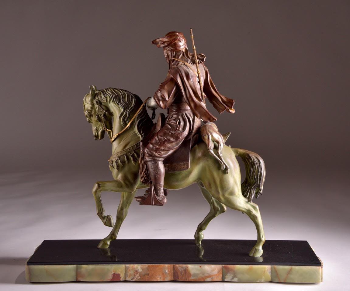 Cold painted metal statue depicting a Arabian hunter.
Signed in the marble; Barge.


 
