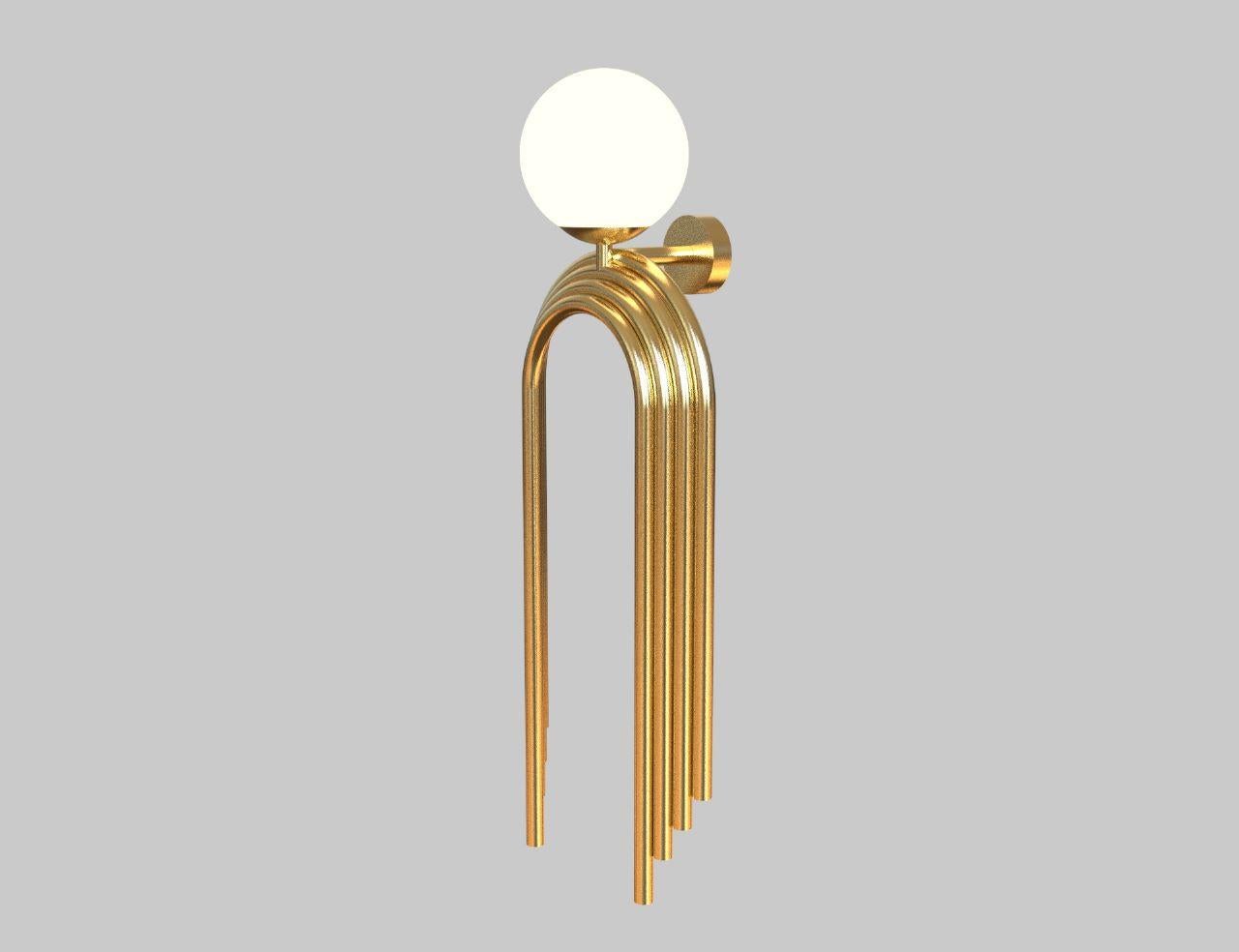 Inspired by the art-deco architecture, this lamp gets a contemporary touch to the form of the overlapping arches. This lamp replicates the idea of repetitive arch patterns with fine elegance and no ornamentation, making it timeless yet reminding of