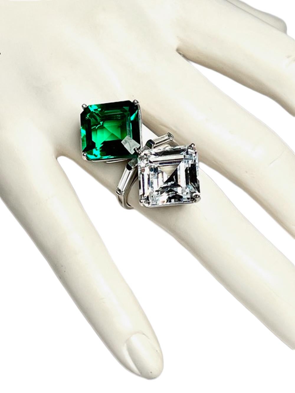 The Art Deco Toi et Moi Love Lab CZ Diamond Cut  and Lab Emerald  Ring

Two stunning man-made diamond and emerald cuts in the Asscher cut style and set with baguettes, Art Deco style  Brilliant D-colour equivalent hand-cut stones set in platinumised