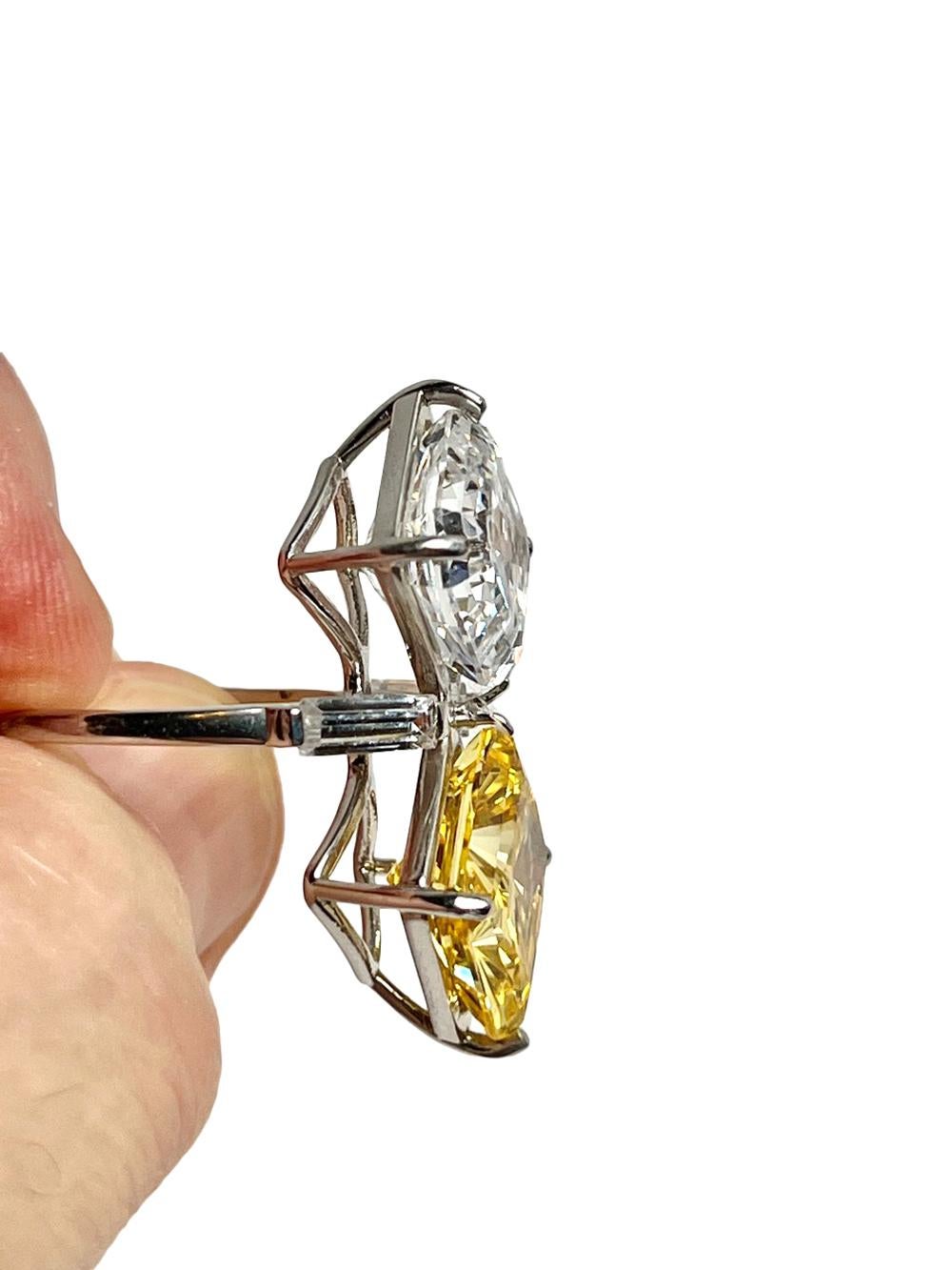 The Art Deco Toi et Moi Love Ring Lab Grown D Grade Diamond Cut Cubic Zirconia  10 Carat Each Asscher Cut White and Canary Yellow Diamonds

Two stunning Lab Grown D Grade Diamond Cut Cubic Zirconia  cut in the Asscher cut style and set with