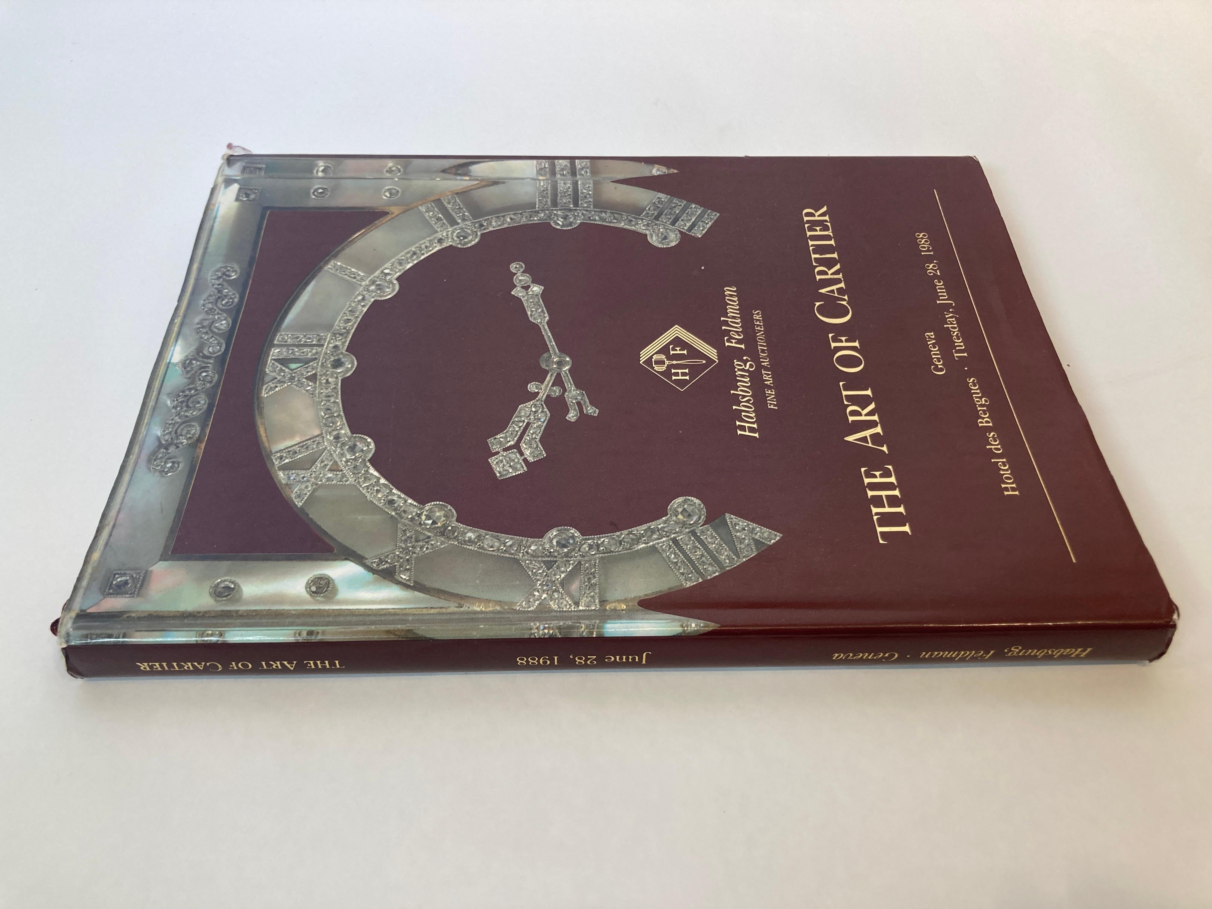 The Art of Cartier 1988 Geneva Auction Hardcover Book Catalog.
The Art of Cartier Habsburg Feldman auction hardcover.
 135 page catalog June 28, 1988, 216 fabulous lots.
Hardcover with dustcover.
Dimensions: 11 in x 8 in.
From the legendary French