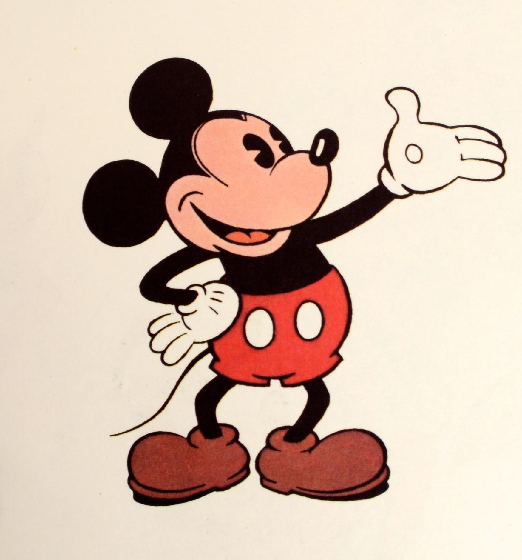 The Art of Walt Disney; From Mickey Mouse to the Magic Kingdoms, by Christopher Finch. Published by H. N. Abrams, 1973. 1st Ed hardcover. 458 pp., 763 Illustrations (351 in color). With raised Mickey Mouse and paint bucket cutouts adhered on the