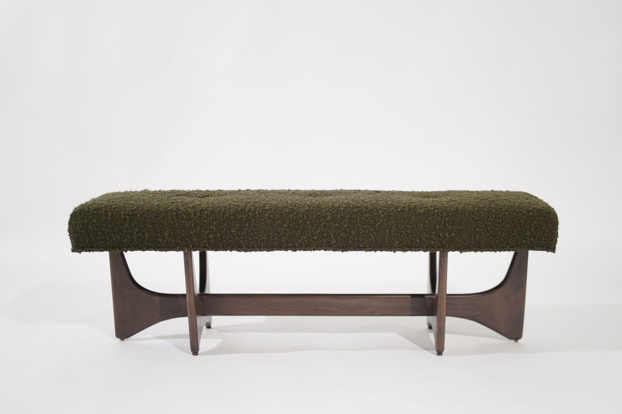 Introducing the Artisanal Bench by Stamford Modern, a captivating sculptural masterpiece that seamlessly blends artistry and functionality. Handcrafted from exquisite solid walnut, this bench elevates any space with its organic shapes and