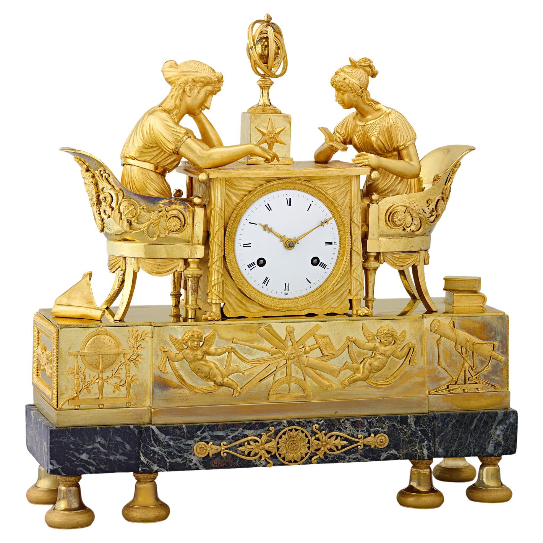 La Lección de Astronomía Reloj de chimenea Imperio Francés en venta