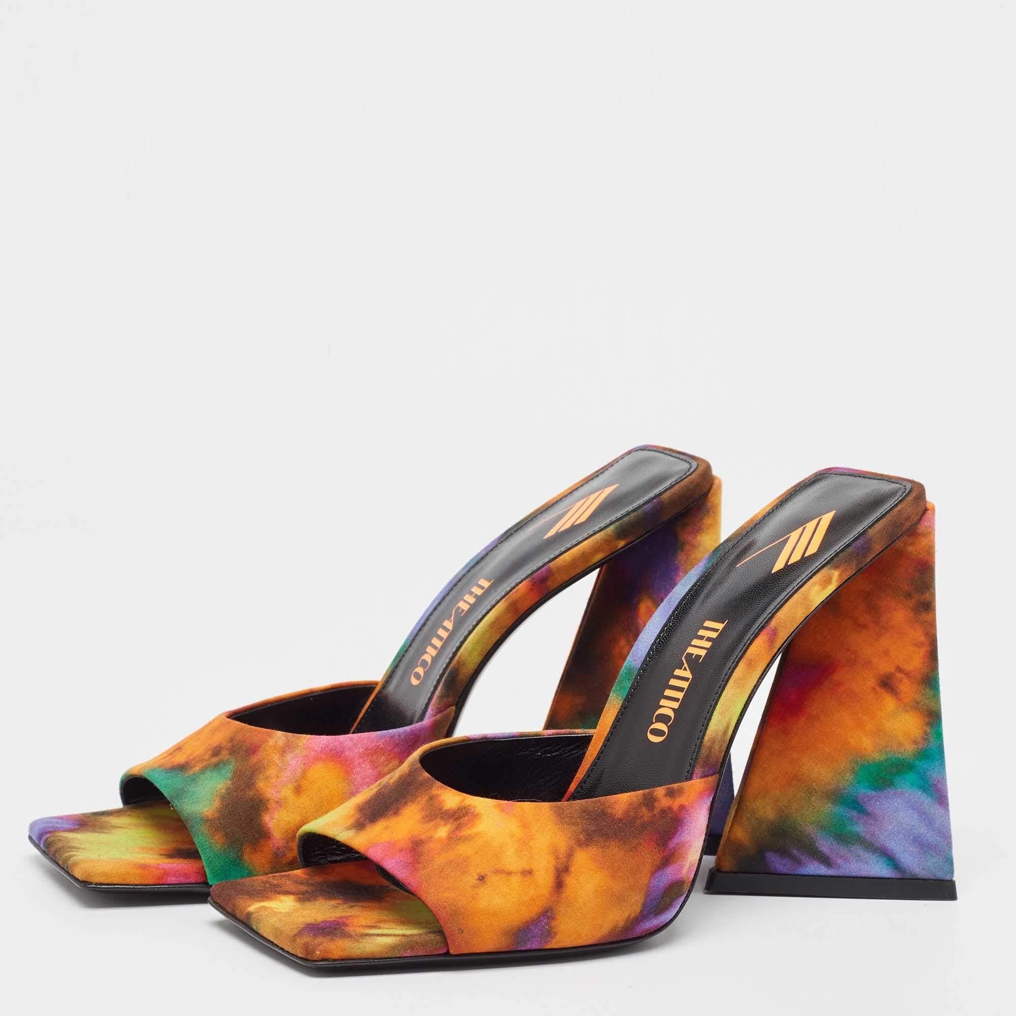 This classy pair of sandals from The Attico looks even better on the feet. The shoes have a multicolor canvas exterior open toes and 11 cm heels.