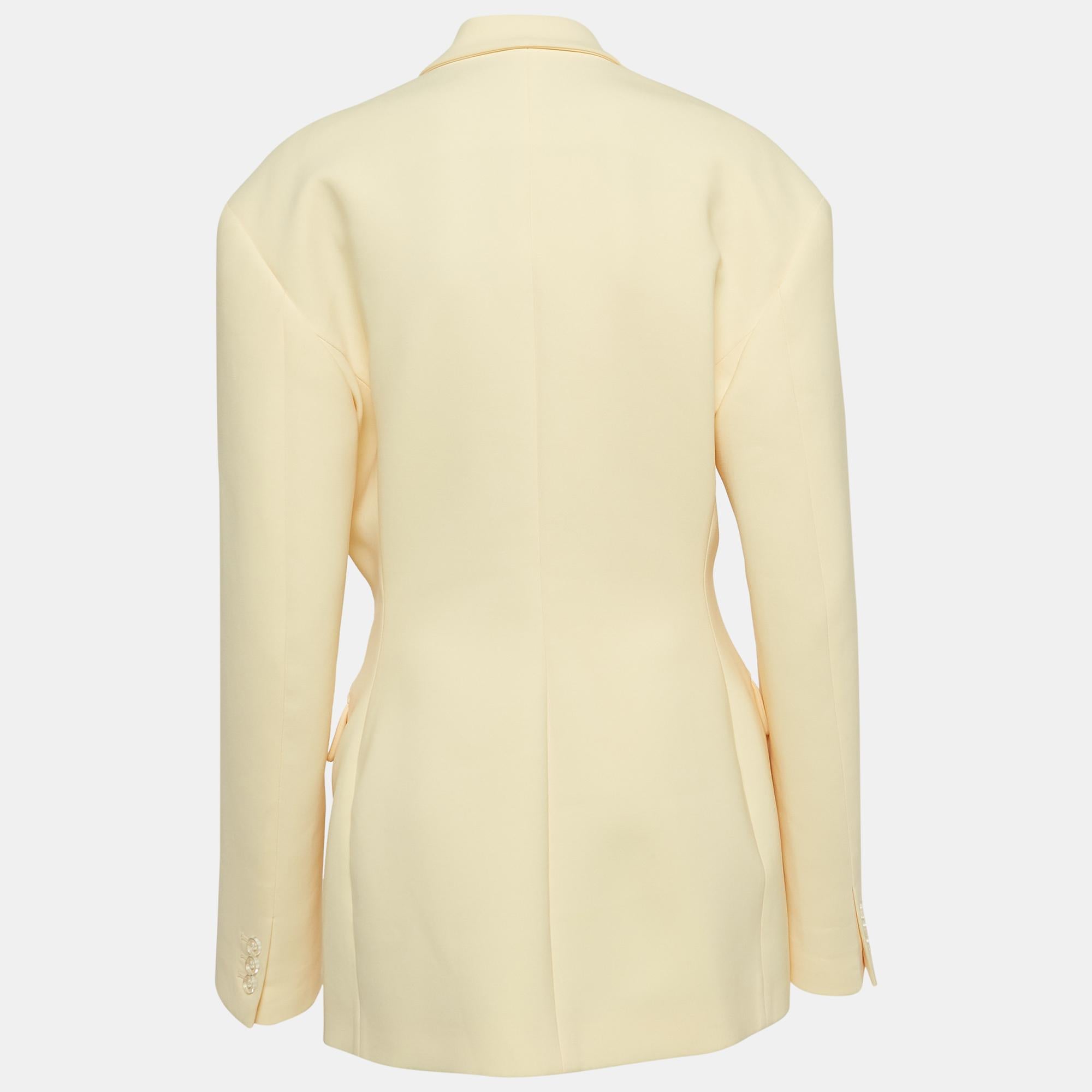 Lend a sharp, fashionable finish to your look with this The Attico blazer. Tailored carefully using quality fabric, the blazer is added with front buttons, pockets, and long sleeves.

Includes: Brand Tag, Extra Button