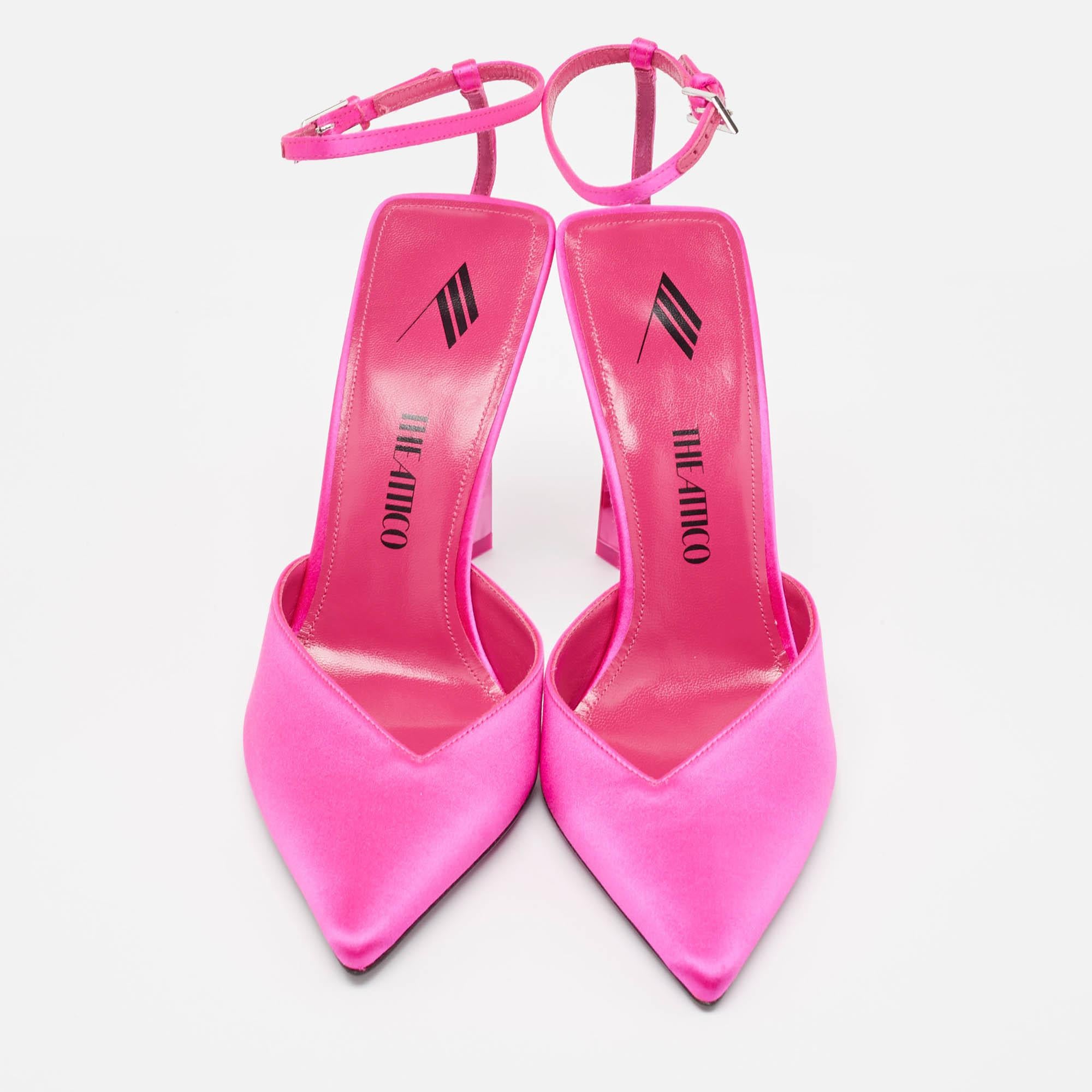 Crafted from lustrous pink satin, The Attico sandals exude timeless charm. With a sleek pointed toe and a delicate strap, these sandals effortlessly blend classic style with modern flair. Perfect for adding a touch of refinement to any ensemble,