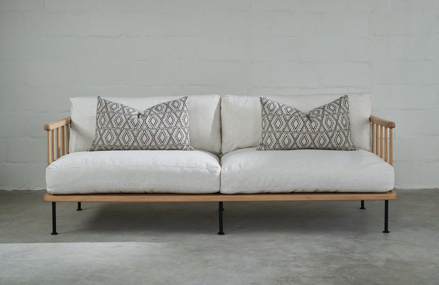 
The Atticus Sofa has a honest and thoughtful design with a quiet and understated aesthetic. Hand made from solid Iroko, upholstered in a locally sourced Linen fabric and filled with a double layer of down feather and high density foam. The Atticus