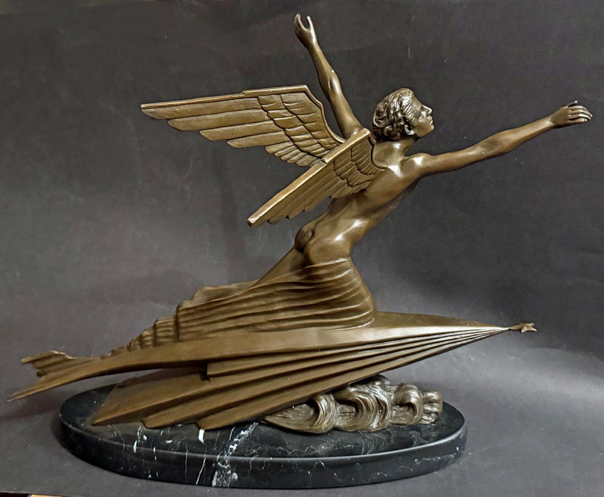 This dramatic, highly streamlined bronze with a nude male figure angled toward the sky illustrates a genre of Art Deco sculpture that was pioneered by Frederic Focht (this example is after Focht).  Entitled 
