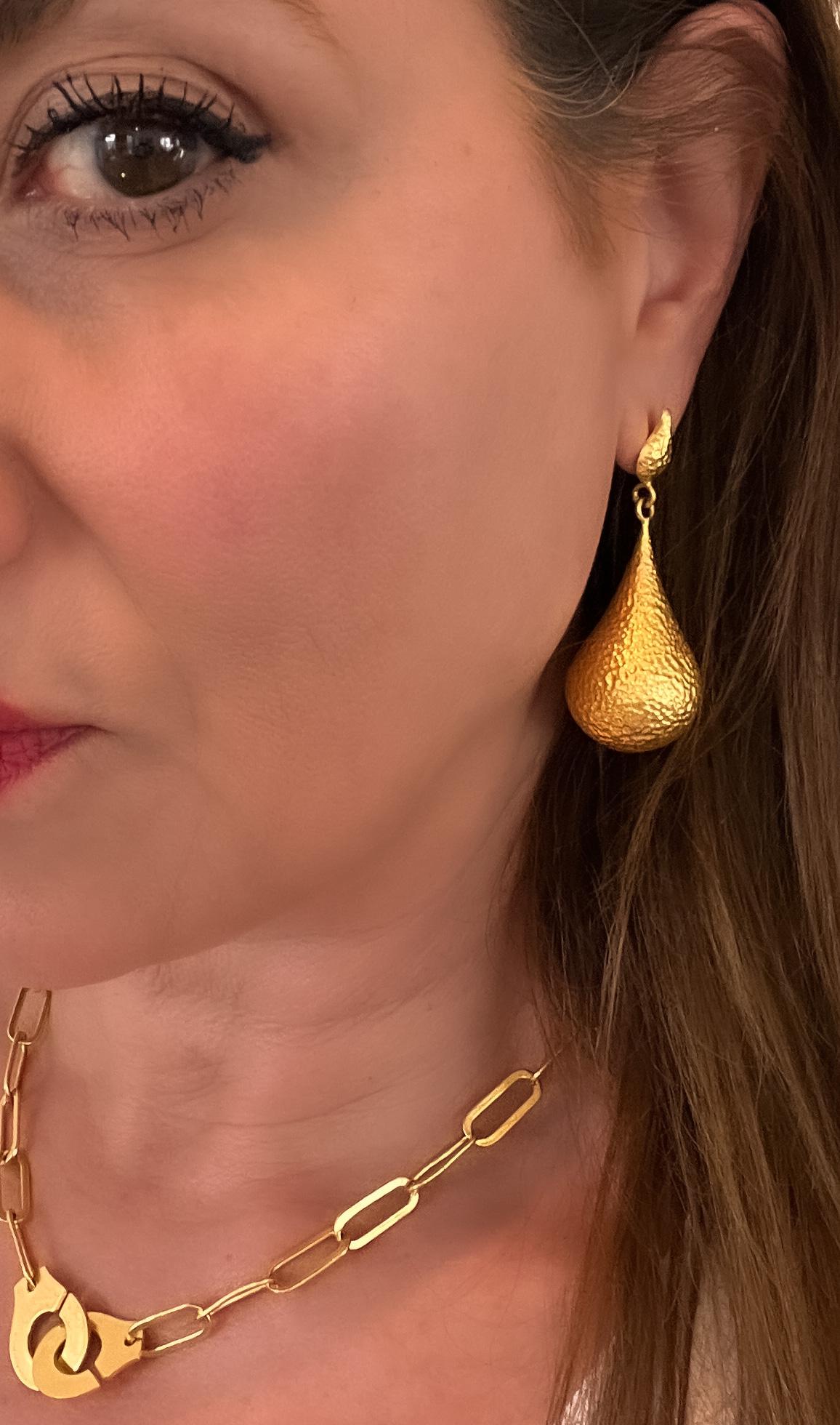 The Bali 20k Gold hand hammered, one of a kind earrings are like wearing royalty! The luxurious color of the gold complimented with the perfect amount of hammering is ideal for day or night. The vibe here is make a wish and watch the magic happen.