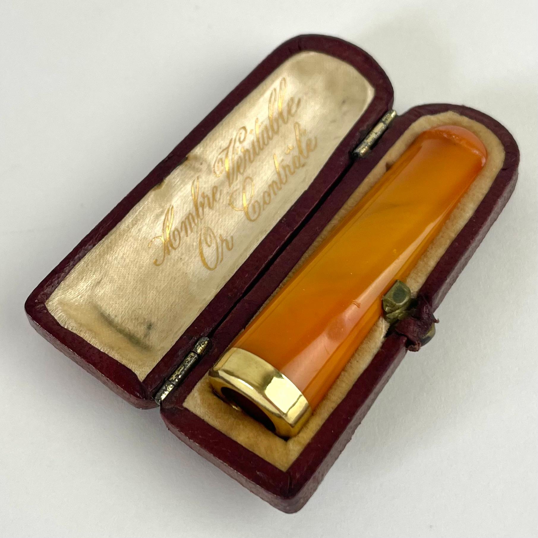 The Baron`s elegant cigarette holder in checked gold and amber. Made in France during the late 19th Century. Provenance: Baron Ehrenkrona, Hulterstad Manor in Sweden. 

Wear consistent with age and use 