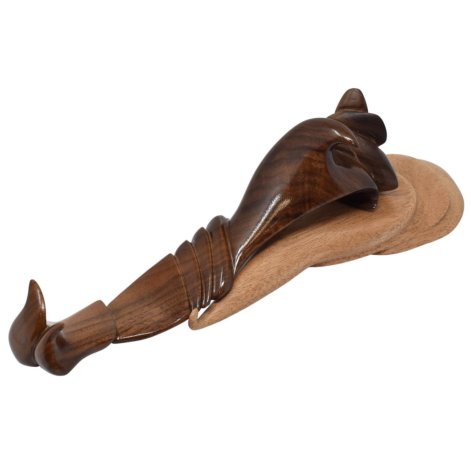 Original wood sculpture

2021

Walnut and African mahogany

Measures: 10.5 L x 2.75 W x 3 H in. / 27 x 7 x 8 cm.