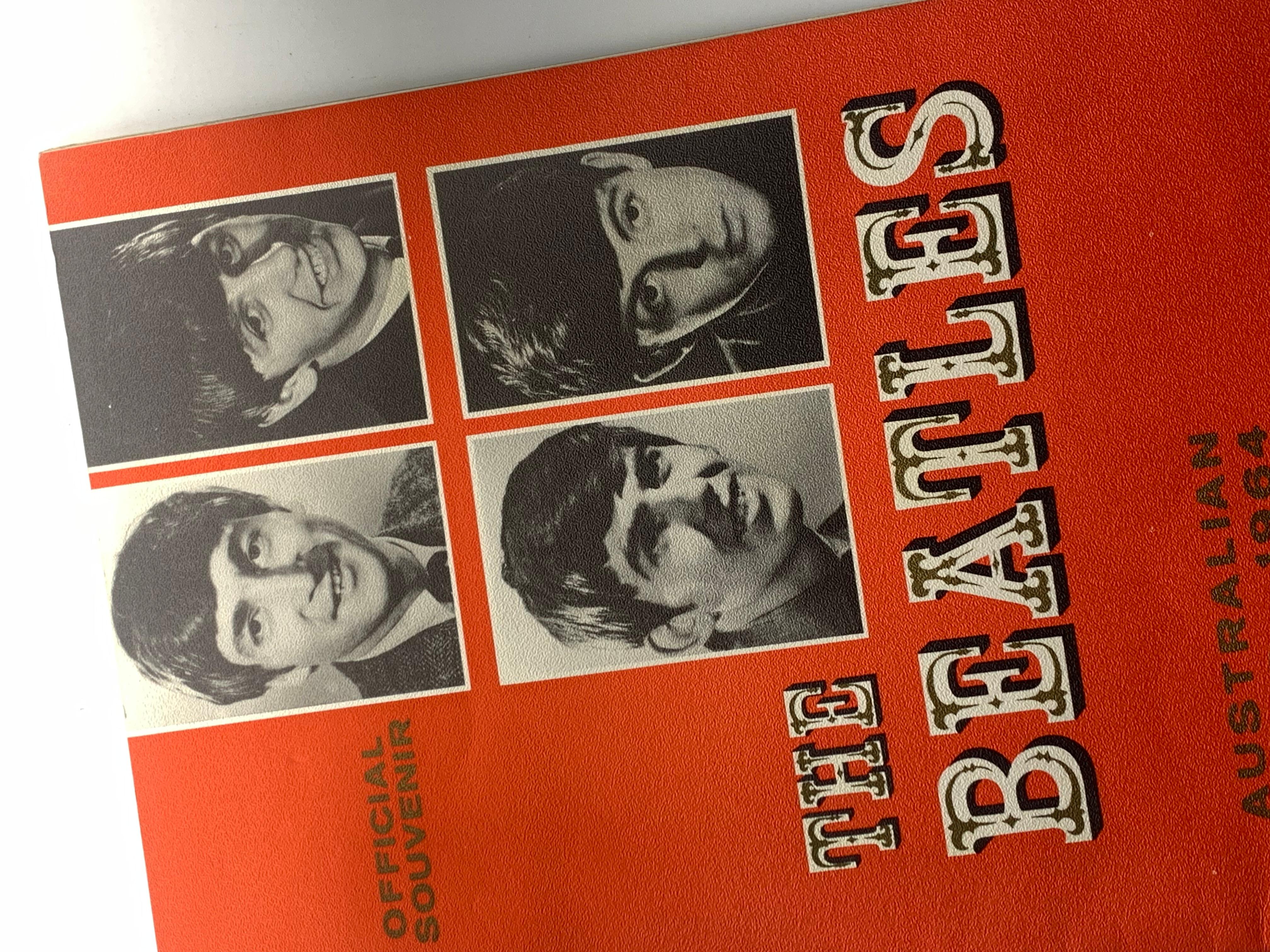 A rare Beatles tour souvenir program from their tour of Australia in 1964
In excellent condition, it had been wrapped in clear plastic by the original purchaser in 1964.
The plastic was taped at the corners and this has transferred to create some