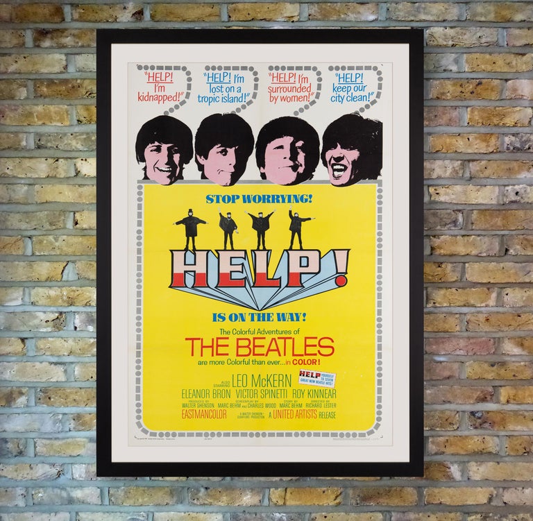 A jolly sunshine-yellow one sheet poster for the original theatrical release of the 1965 Beatles romp 'Help!,' featuring photographer Robert Freeman's image of the Fab Four posing in flag semaphore formation for the cover of their soundtrack album