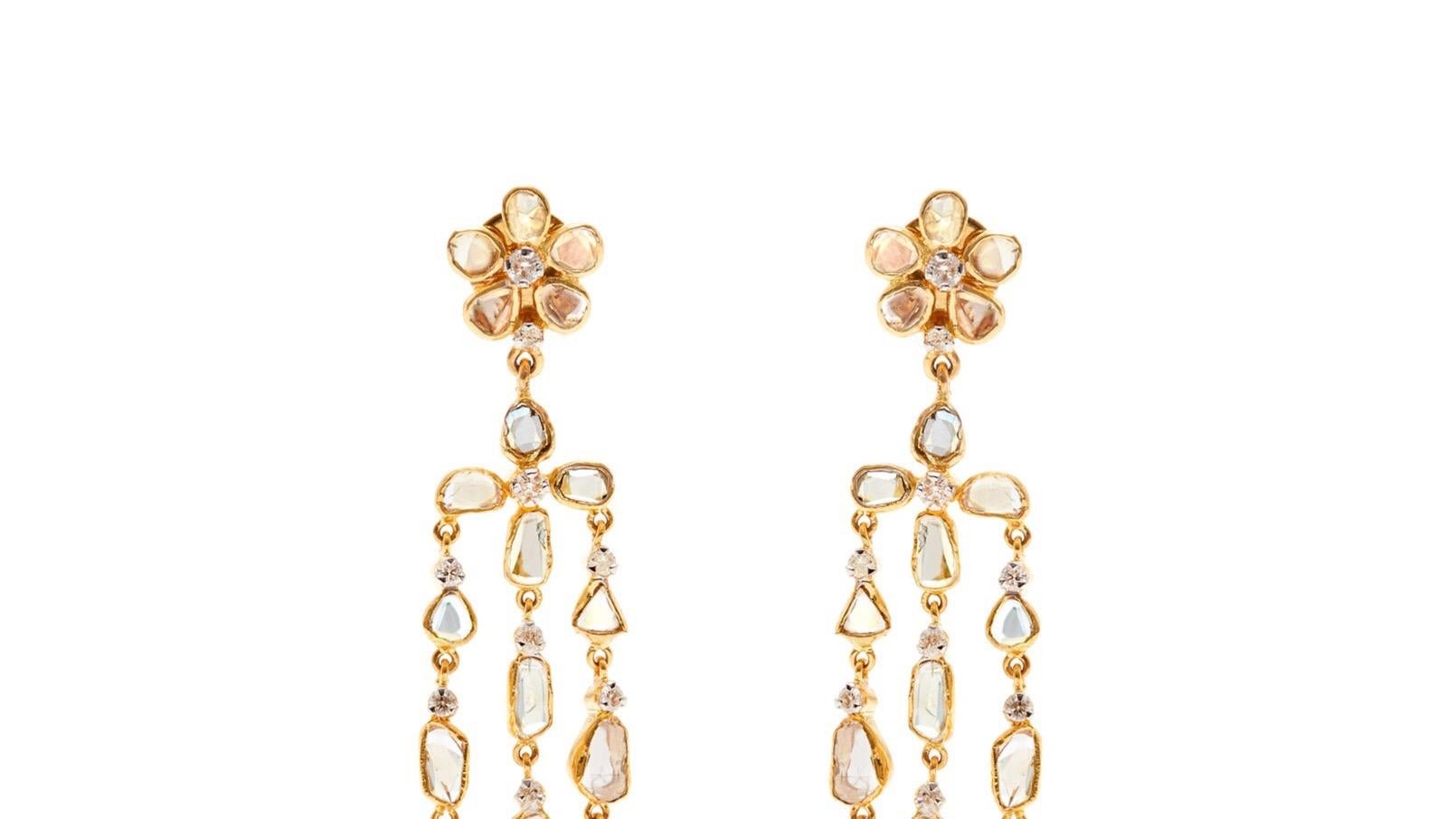 Diamond Chandelier 18 Karat Gold earrings featuring just approx 6 Carats of Brilliant Cut and fine quality Polki Diamonds. “The Beautiful Ones” feature a melange of finely shaved White Diamonds accented with Brilliant Cut Diamonds set into