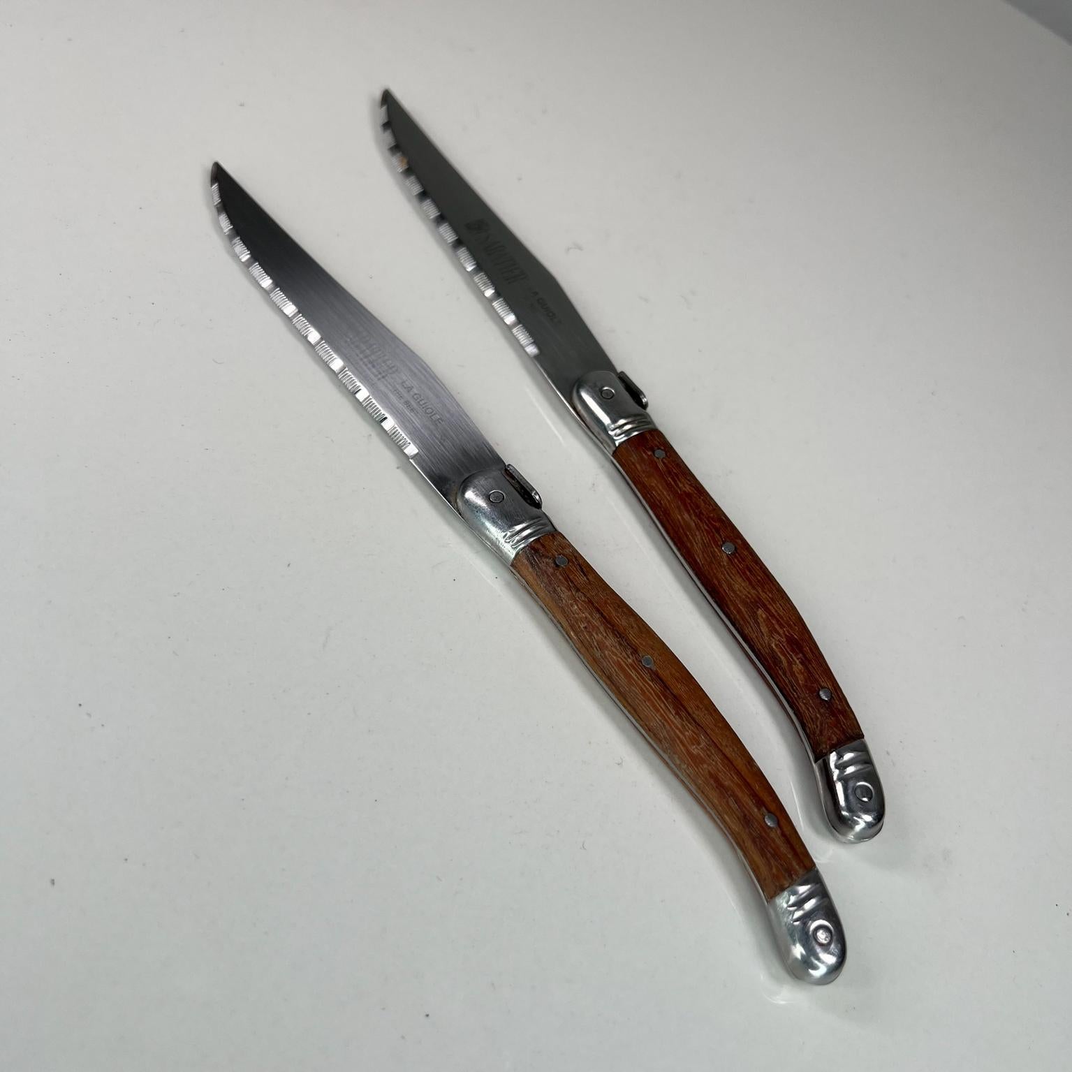 The Bee Laguiole two knives Sabatier France
Wood handle stainless steel 
9 long x .5 x .5
Maker stamp
Preowned vintage condition.
See images please.
 