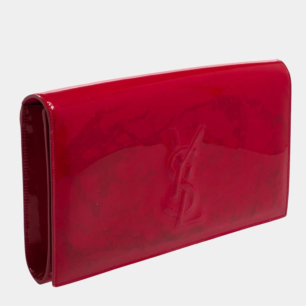 The Belle De Jour clutch by Yves Saint Laurent is a creation that is stylish and exceptionally well-made. It is a simple and sophisticated design, just right for the woman who embodies class in a modern way. Meticulously crafted from patent leather,