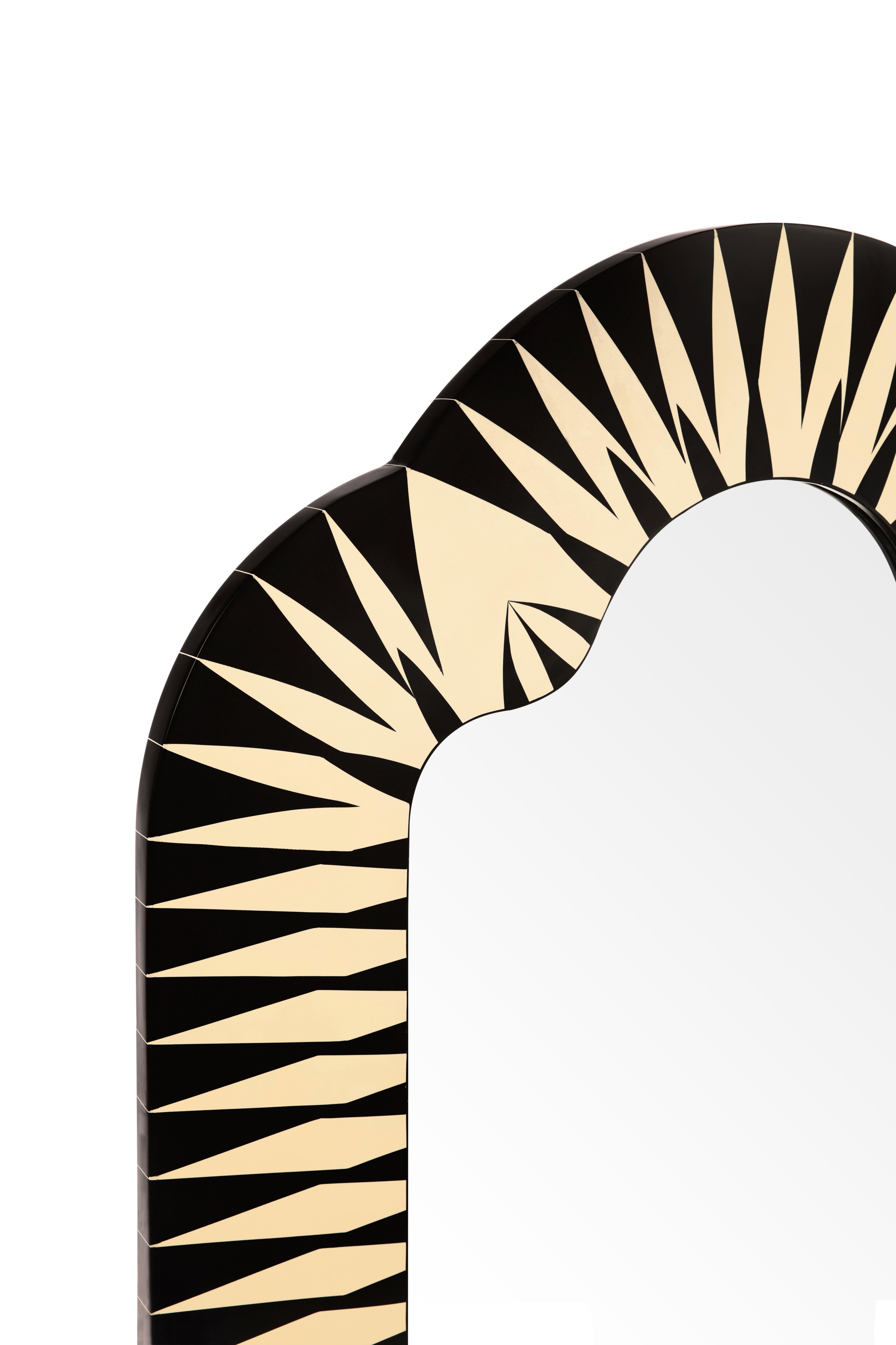 The Big Parade Console Wall Mirror by Matteo Cibic is a large fun shaped mirror.

India's handicrafts are as multifarious as its cultures, and as rich as its history. The art of bone and horn inlay is omnipresent here. Artisans from the Northern