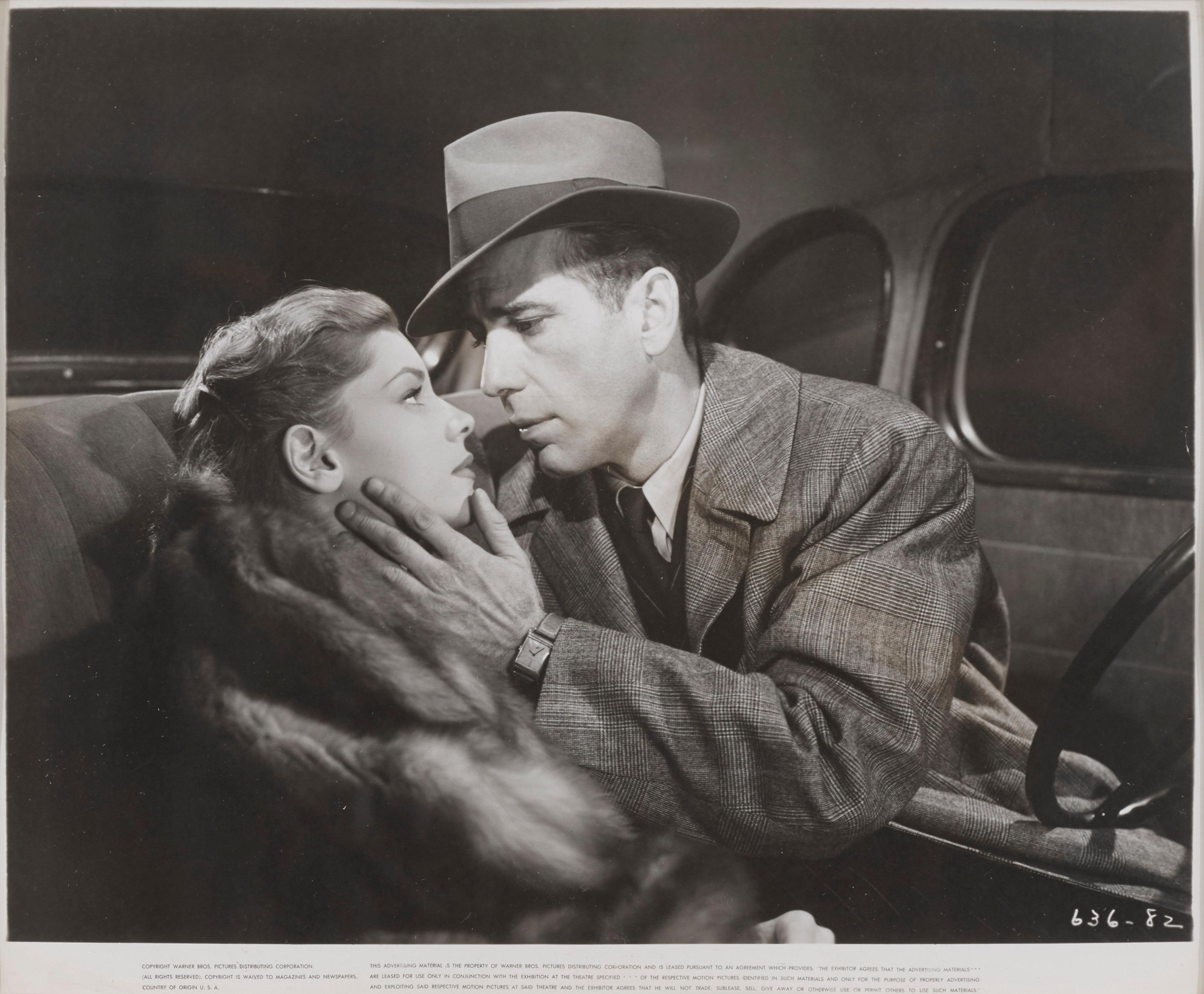 Original US photographic production still for Howard Hawks 1946 Film Noir staring Humphrey Bogart and Lauren Bacall. Bogart plays private detective Philip Marlowe It is now considered one of the great Film-Noir titles. This piece is conservation