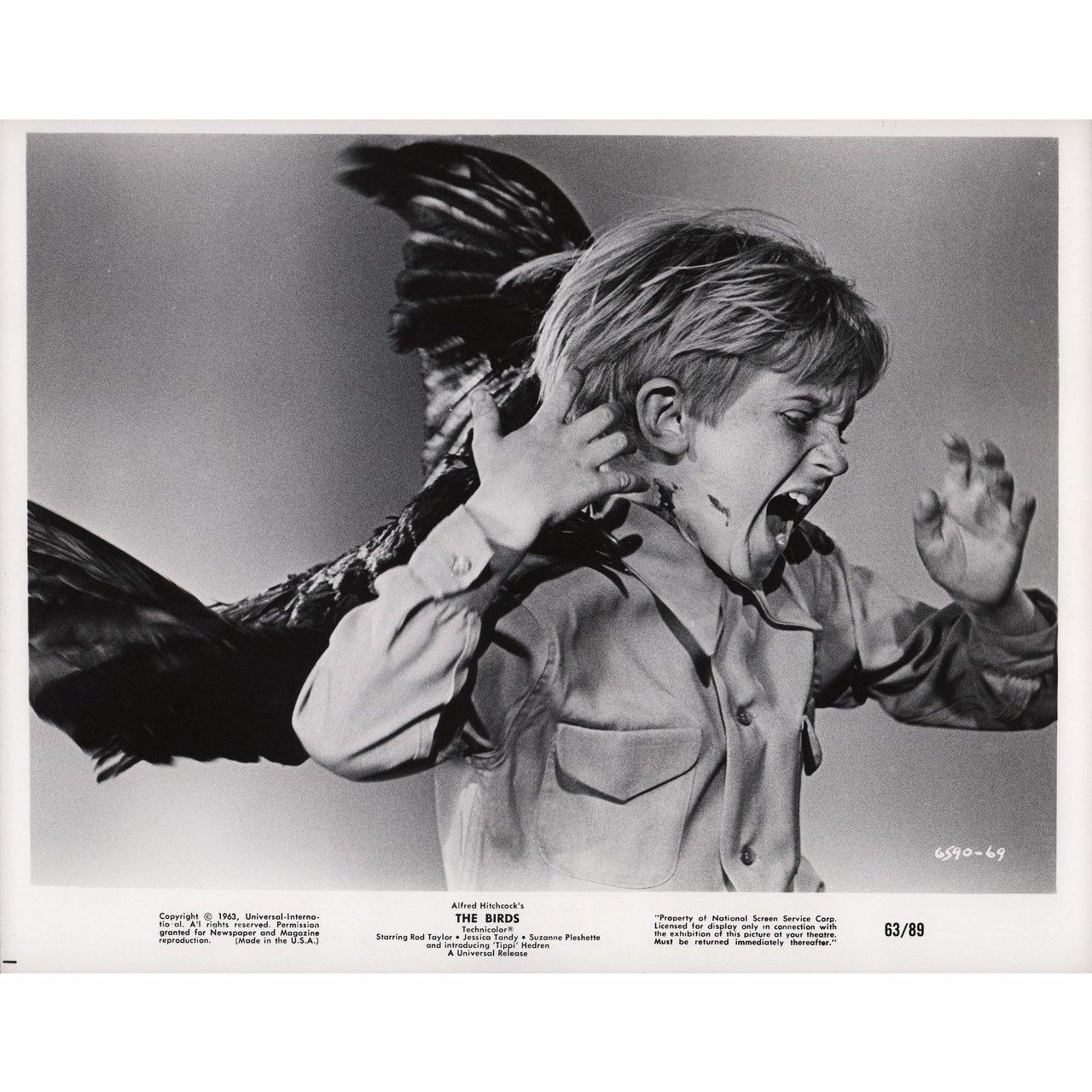 Original 1963 U.S. silver gelatin single-weight photo for the film “The Birds” directed by Alfred Hitchcock with Tippi Hedren / Suzanne Pleshette / Rod Taylor / Jessica Tandy. Fine condition. Please note: the size is stated in inches and the actual