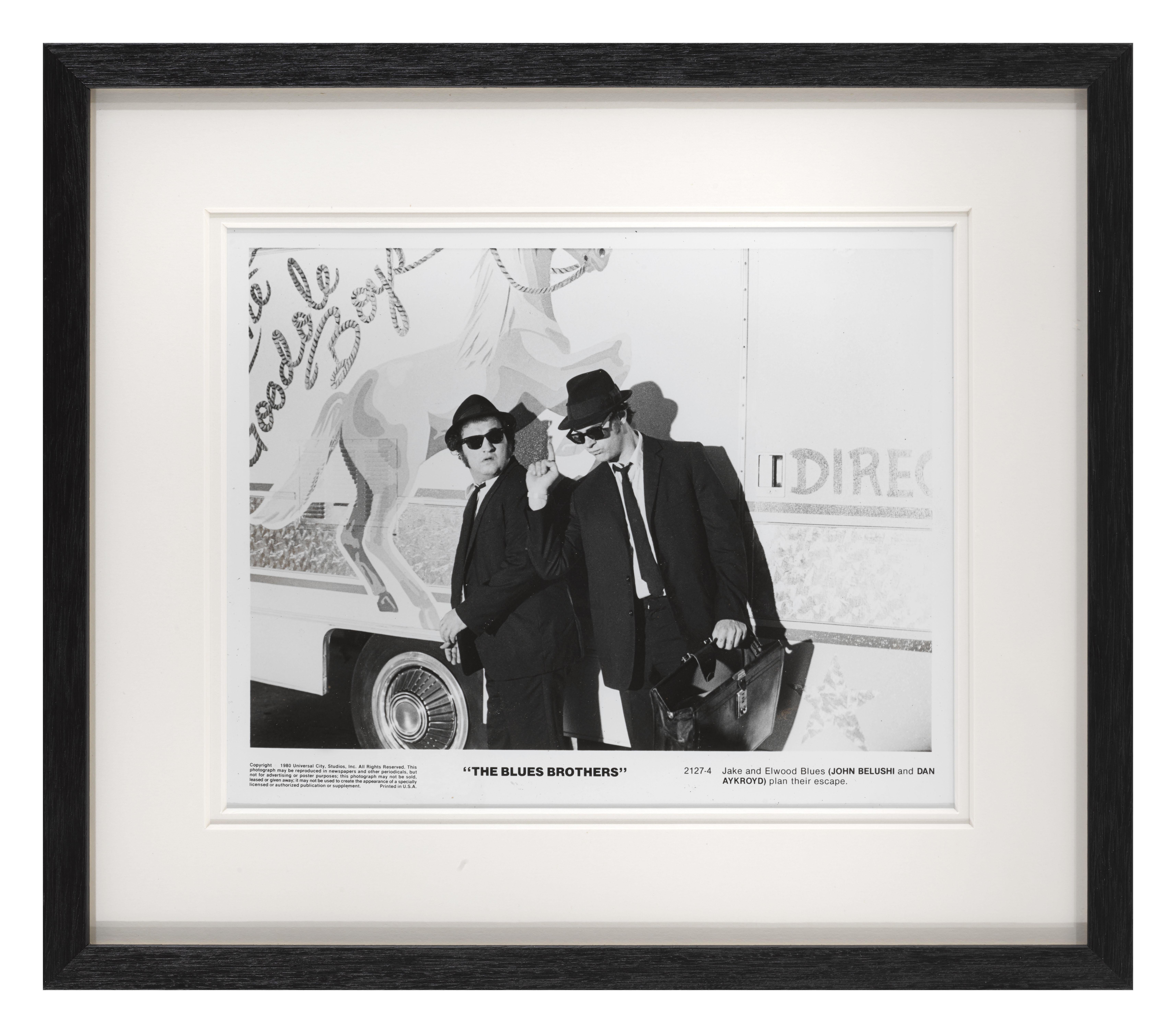 Original US black and white Production Still used by the studio to advertise the film. these stills were sent out to news papers. This piece shows John Belushi, Dan Akroyd playing Jake and Elwood Blues in this cult Classic directed by John
