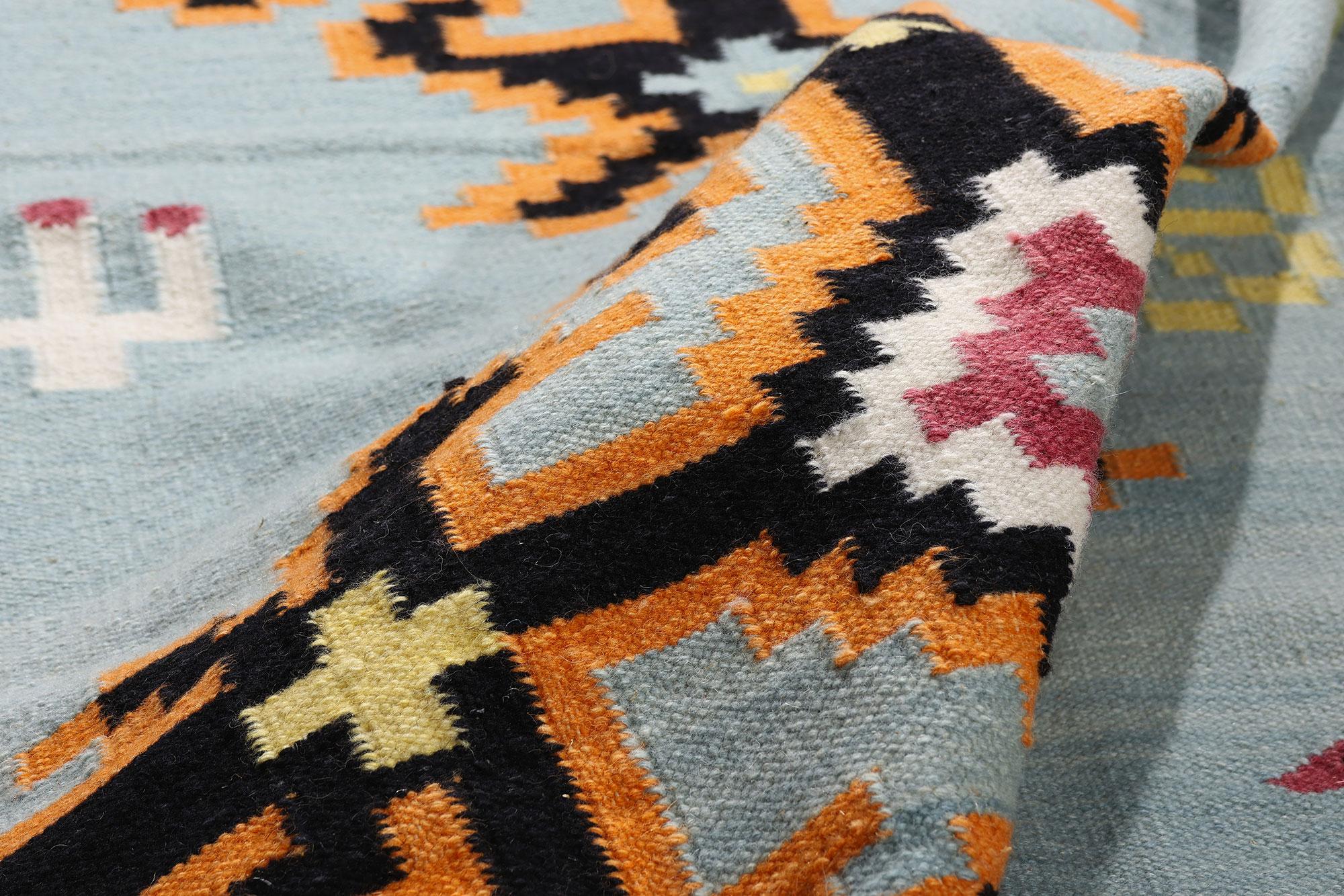 31351 New Light Blue Modern Indian Kilim Rug, 06'02 x 09'02. Woven from fine hand-spun wool, this modern Indian kilim rug exudes a cultivated elegance where tradition and contemporary design converge. Its composition is at once commanding and