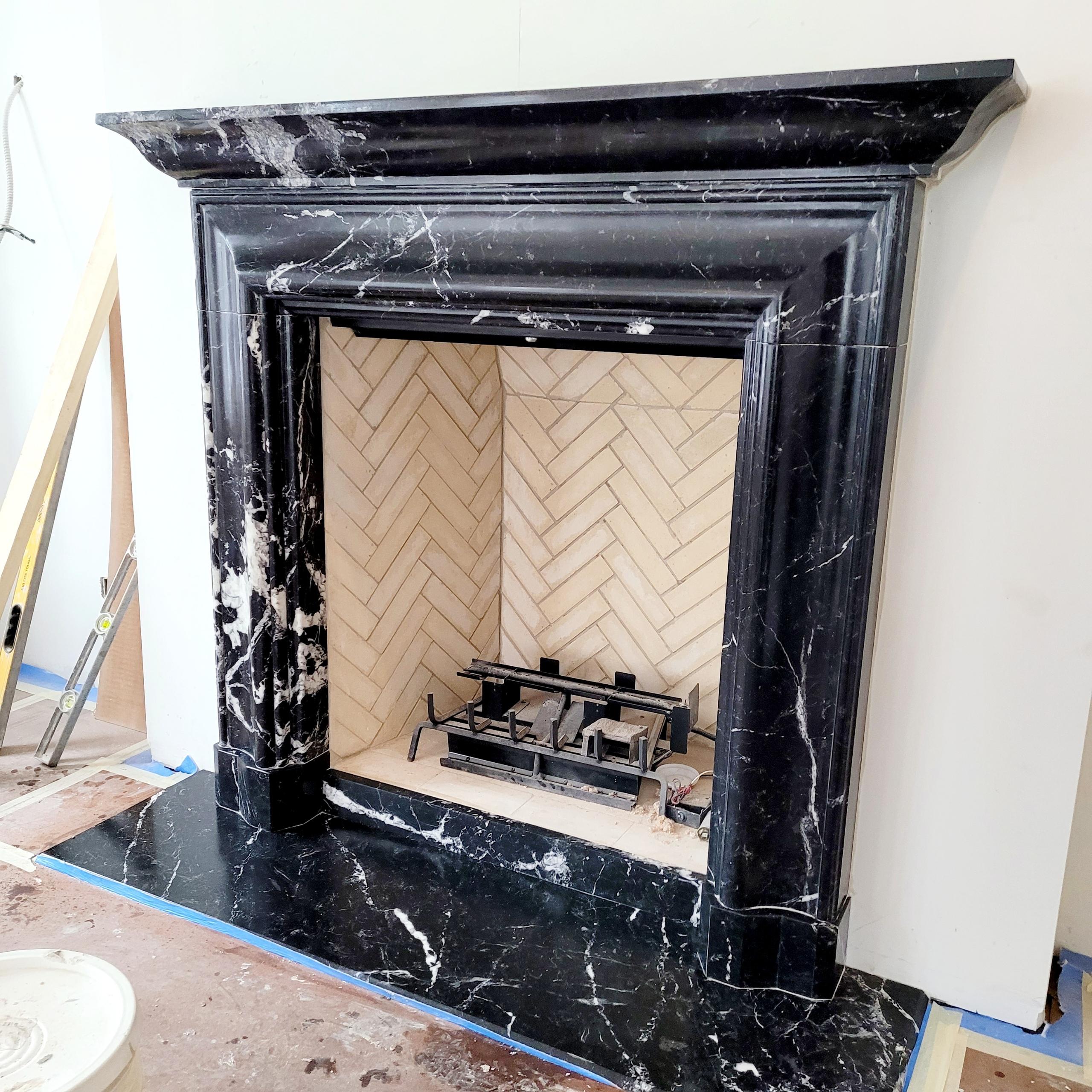 American The Bolection B: A Classical Stone Fireplace Profile with Shelf and Plinths For Sale