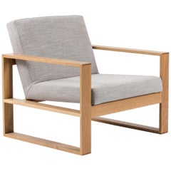 The Box Chair Modern Lounge in American Oak with concrete grey Upholstery