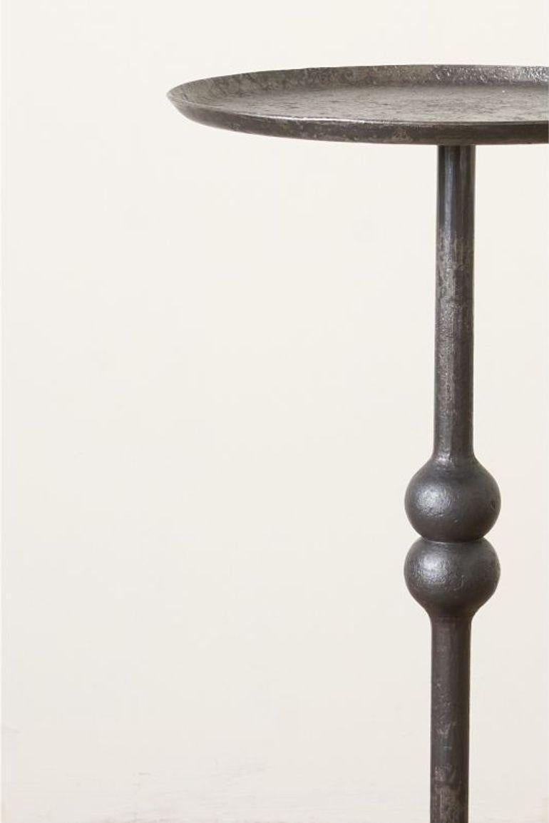 This is our 'Brokkr' martini table. Made right here in Yorkshire by Sam our blacksmith from forged steel. Every detail is beaten and shaped by hand from the patina on the table to the tools used to create this table. The tools themselves were made