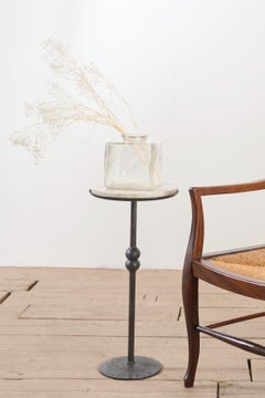 The 'Brokkr' forged steel martini table with quartzite top