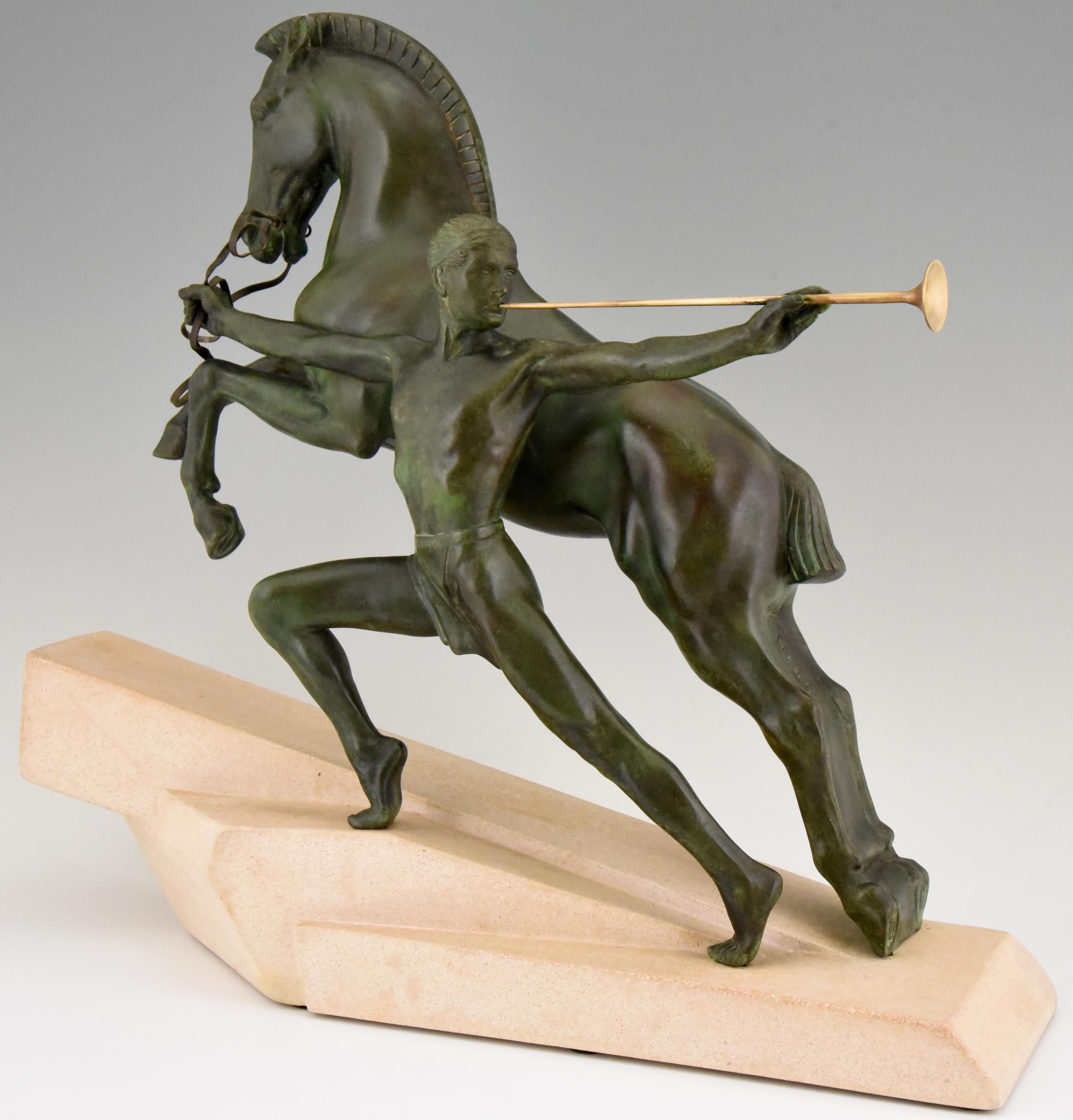 Impressive Art Deco group of a man with trumpet and a horse. This sculpture is signed by C. Charles and cast at the Max Le Verrier foundry. The title of the work is l'Appel or The Call. Patinated Art metal on a sandstone base. France 1930. 

“The