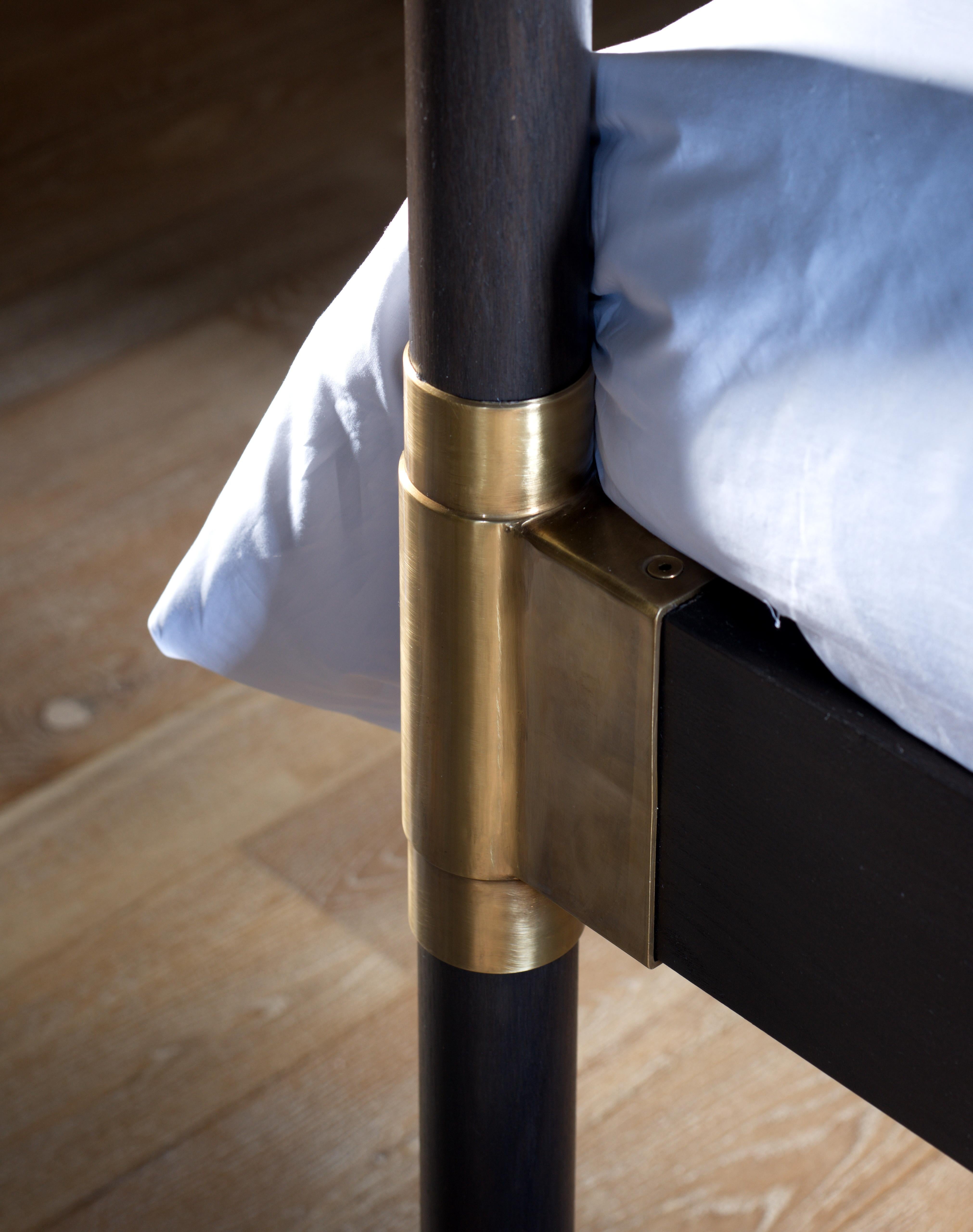 brass four poster bed