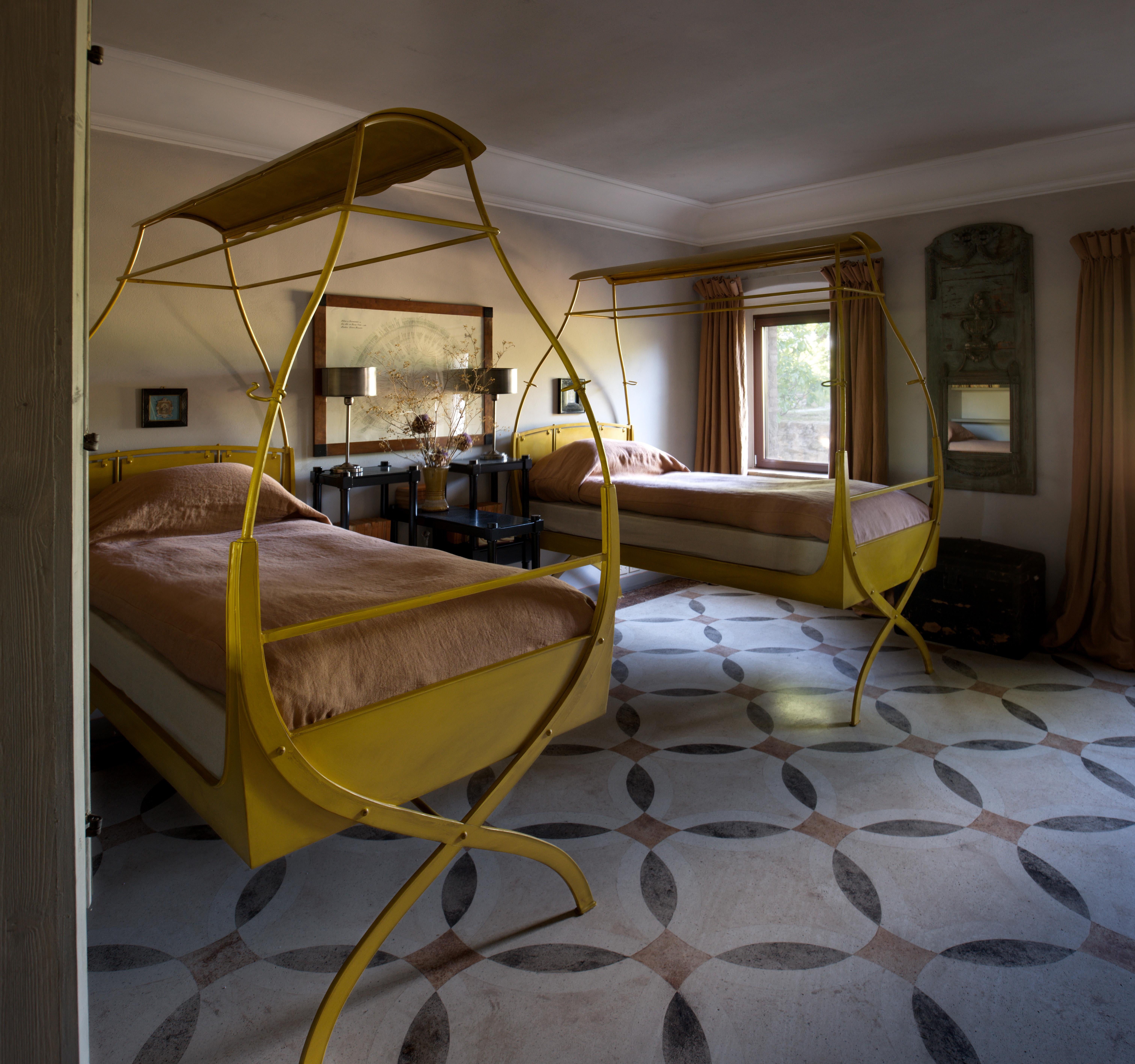 A painted steel X-frame bed
B.B. - A surreal interpretation of a Classic Italian design, part fairground ride and part swing. I love its sinuous form. Canary yellow seems to suit it best.
Specifications: painted steel, able to take either a