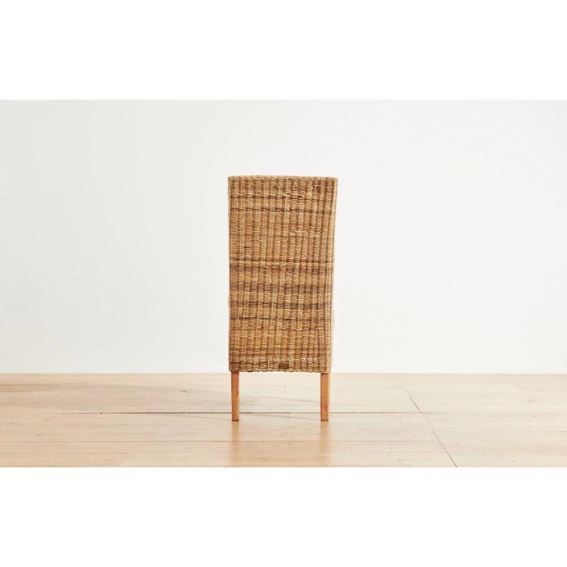 Organic Modern Handwoven Malawi Cane Dining Chair in Closed Weave with White Linen Cushion For Sale