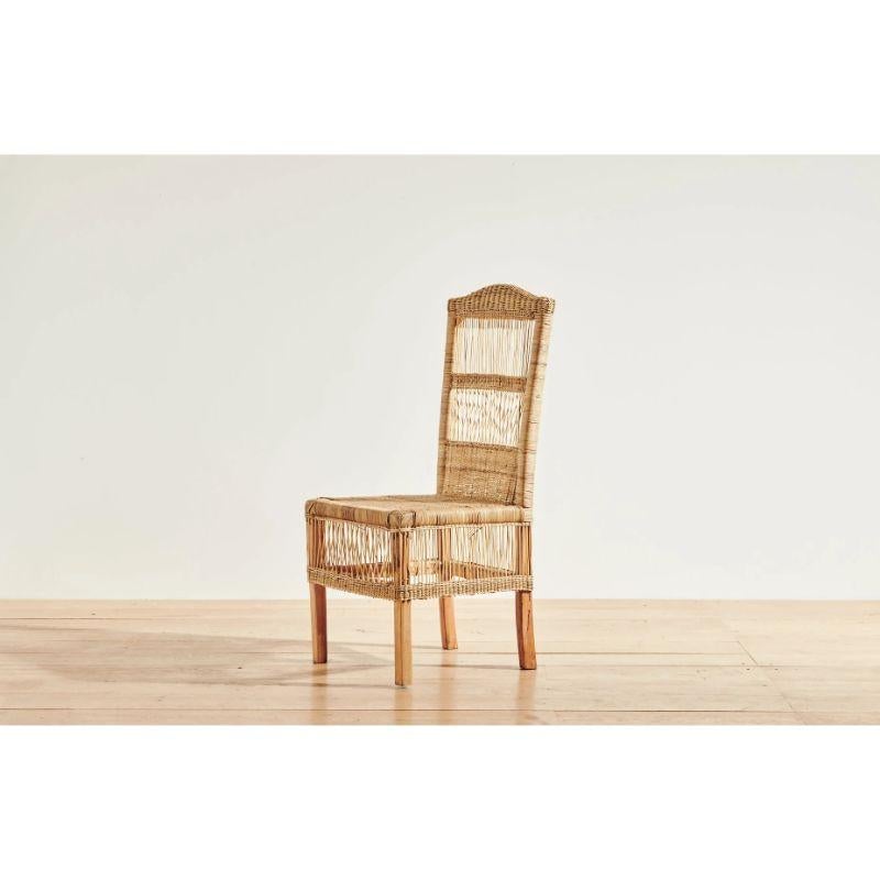 Organic Modern Handwoven Malawi Cane Dining Chair in Open Weave with White Linen Cushion For Sale