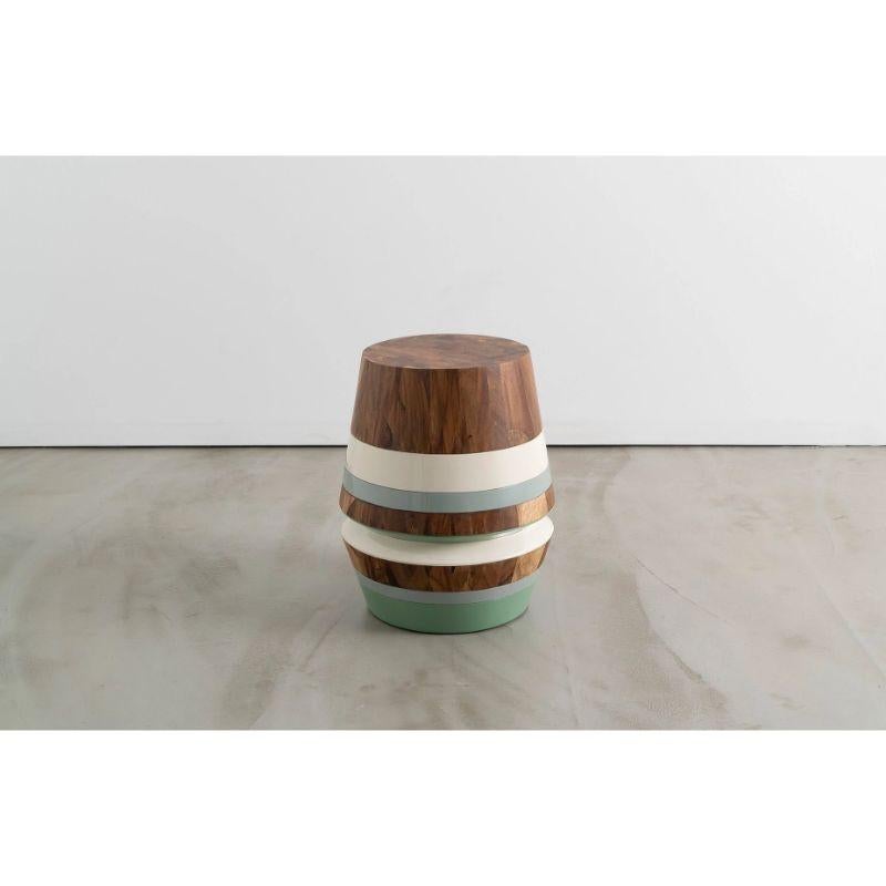 This turned wood and lacquer table will add a friendly, colorful element to your living room, bedroom, workspace, or entryway with its calming blues and whites and rich concaste wood rings. Place it beside your bed for daily use, let it house your