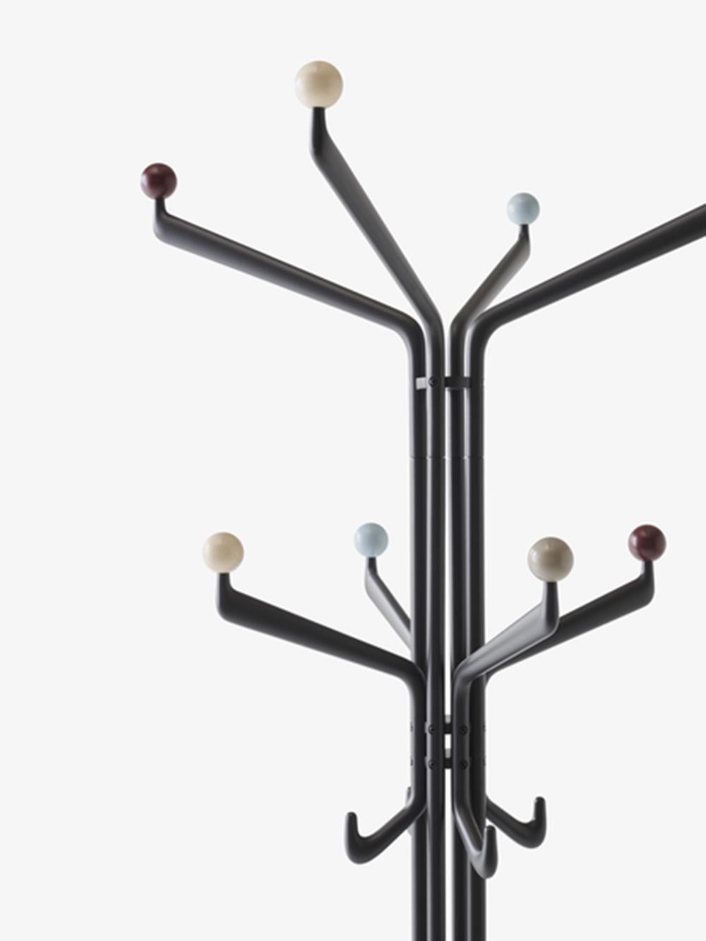 The Capture coat stand is a sophisticated design that will stand out in an interior. Ideal for both contract and retail spaces, this three-tiered piece offers a sculptural take on a traditional piece of furniture, with arms that offer different