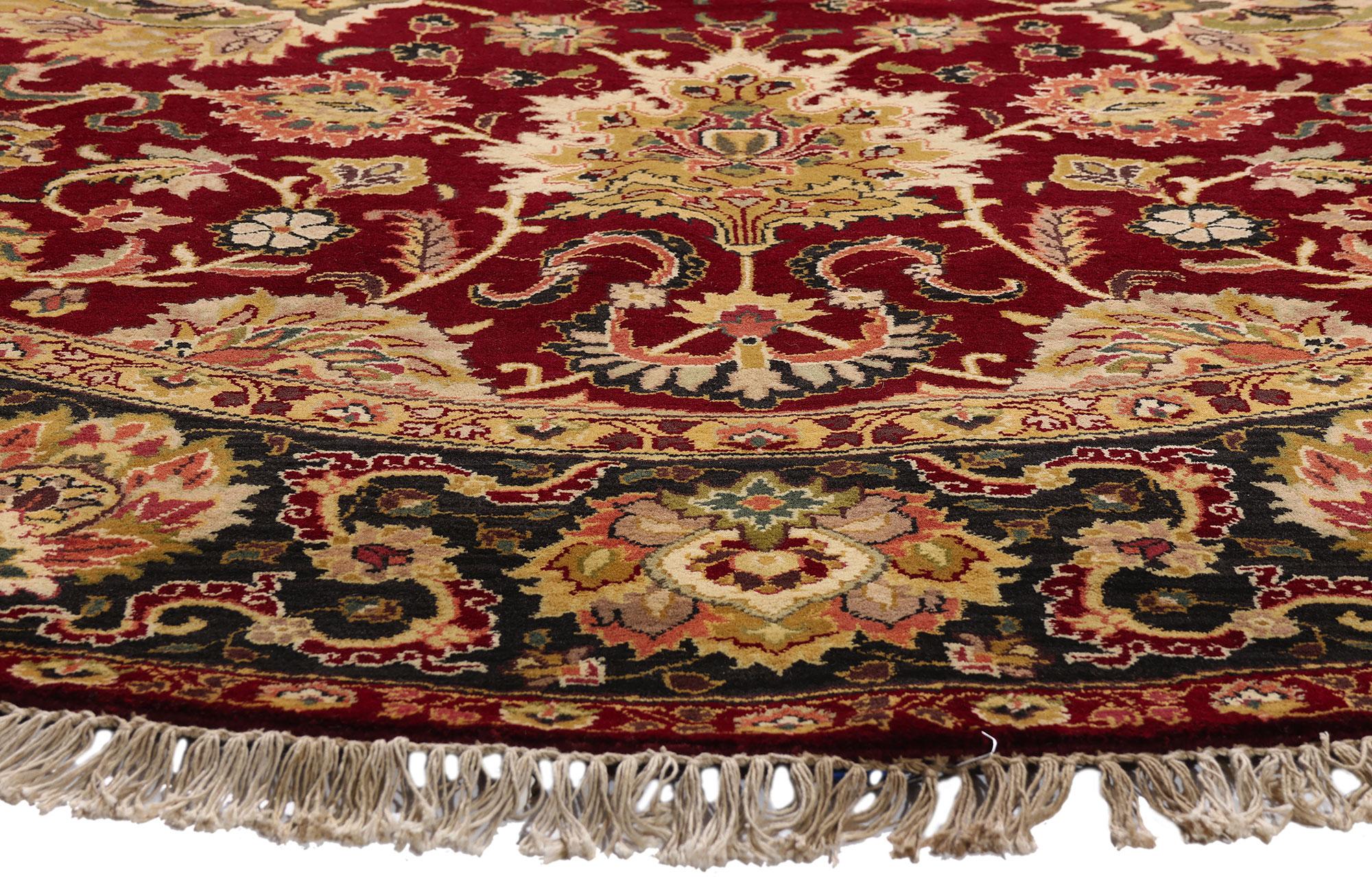 20ième siècle Le cercle céleste : Un Oushak indien vintage cramoisi d'une élégance impériale en vente