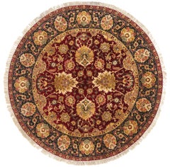 Der himmlische Kreis: Ein Vintage Crimson Indian Oushak von kaiserlicher Eleganz